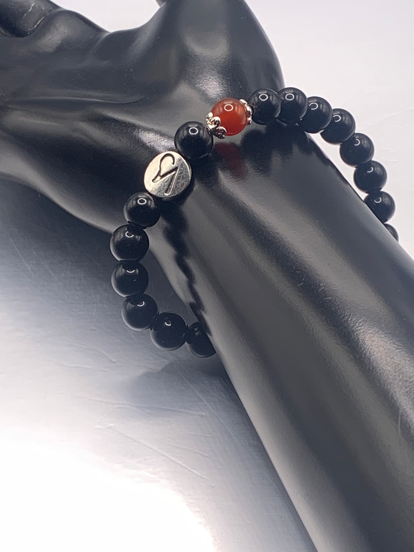 Capricorn Zodiac black obsidian with red agate elastic beaded bracelet with silver accents