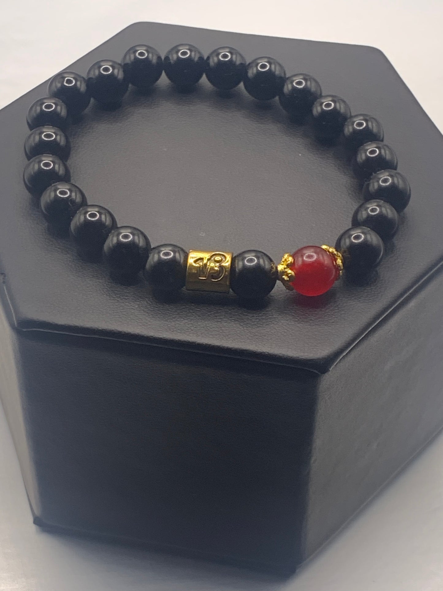 Capricorn Zodiac black obsidian with red chalcedony elastic beaded bracelet with gold accents