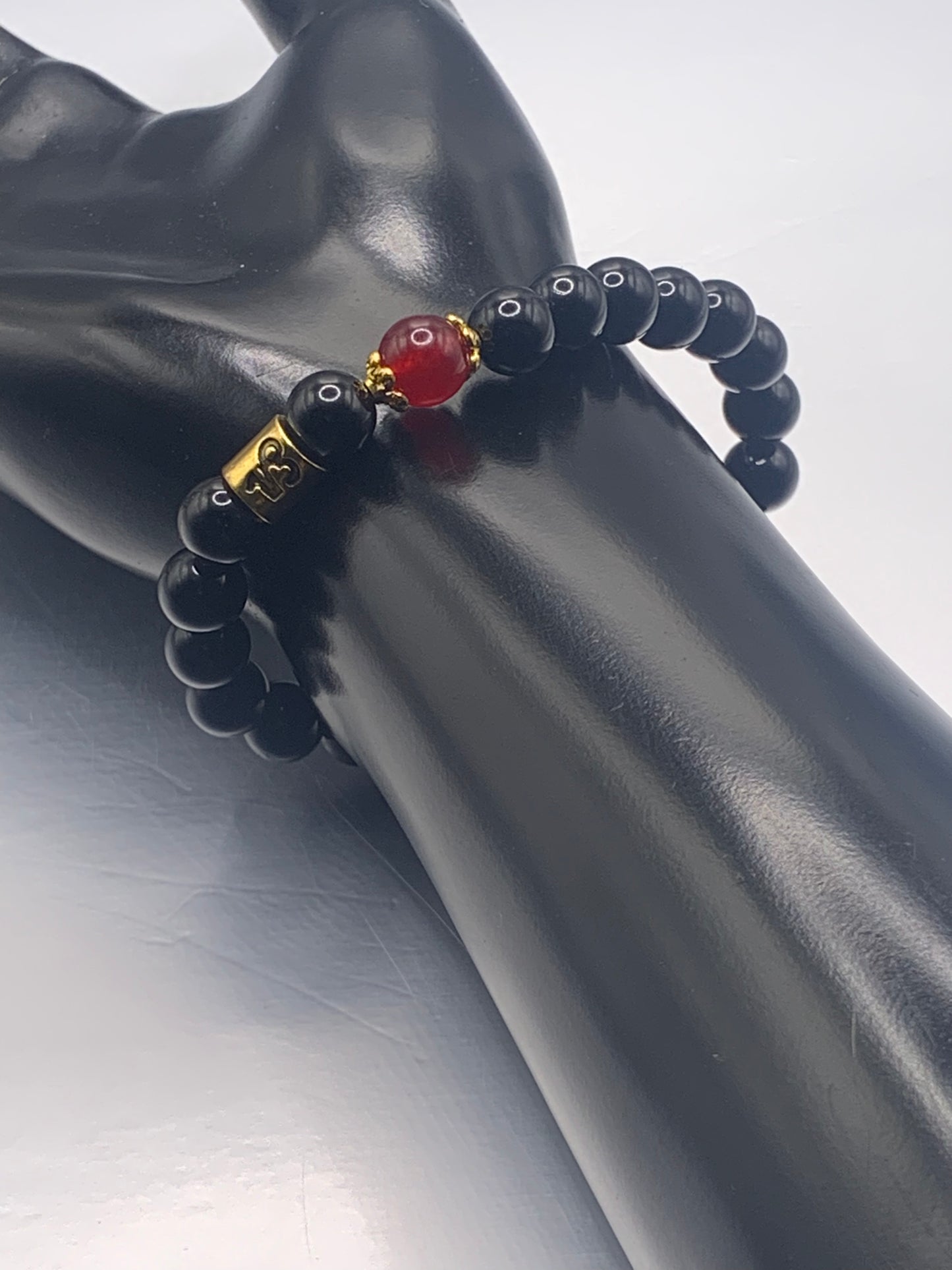 Capricorn Zodiac black obsidian with red chalcedony elastic beaded bracelet with gold accents