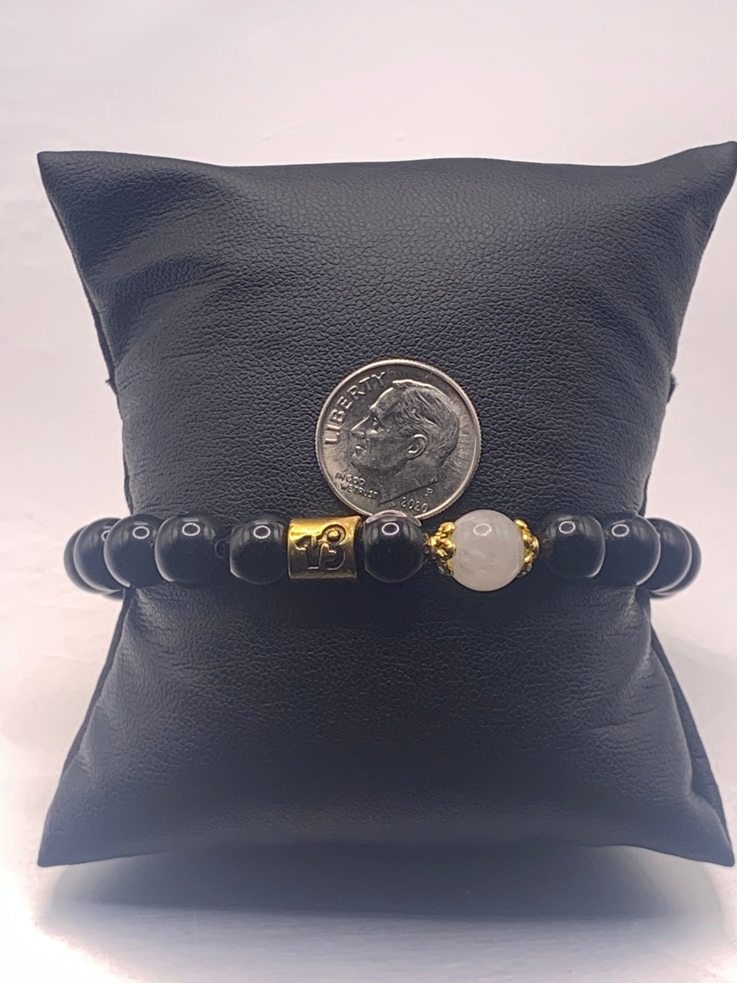 Capricorn Zodiac black obsidian with white chalcedony elastic beaded bracelet with gold accents