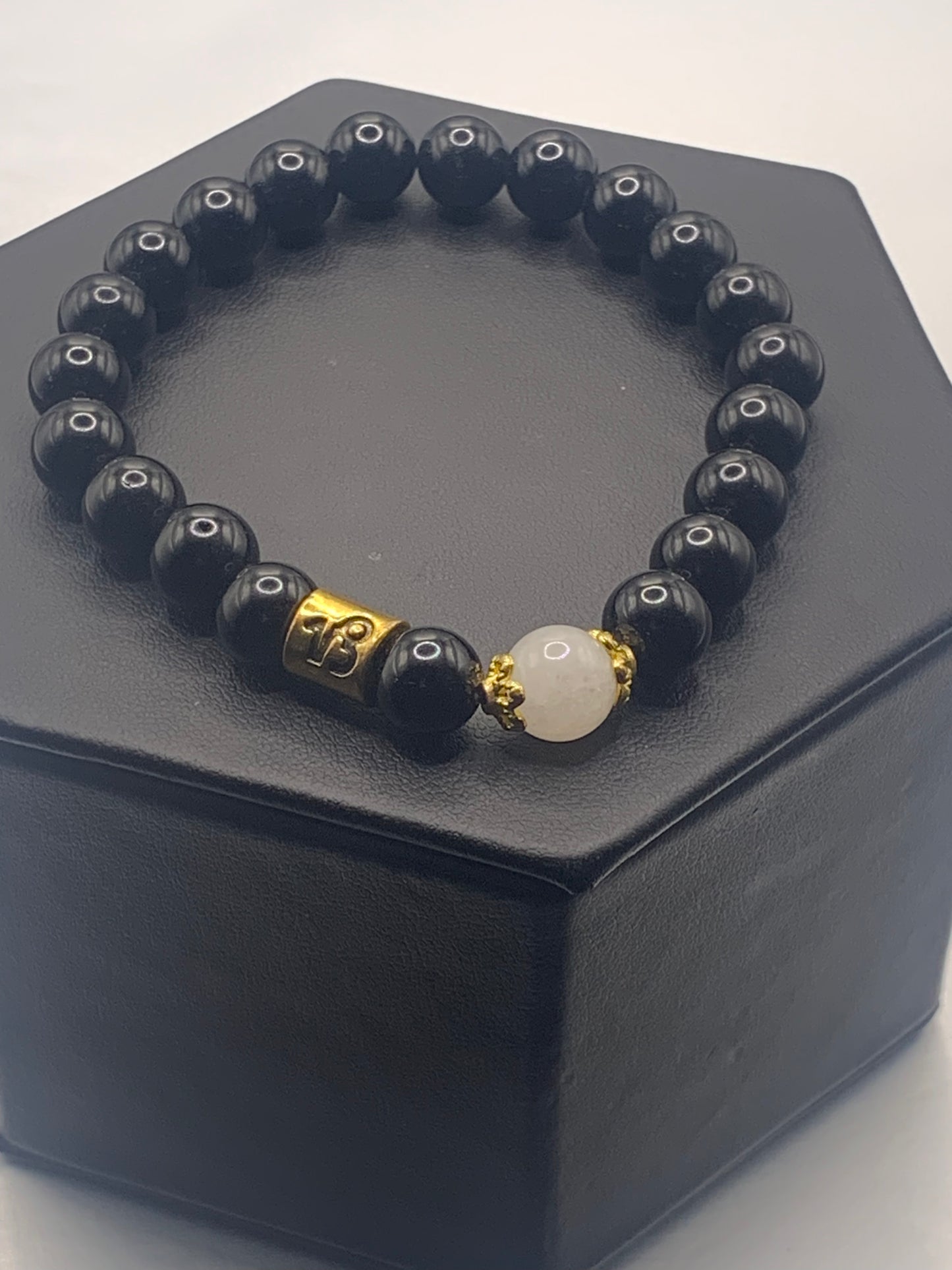 Capricorn Zodiac black obsidian with white chalcedony elastic beaded bracelet with gold accents