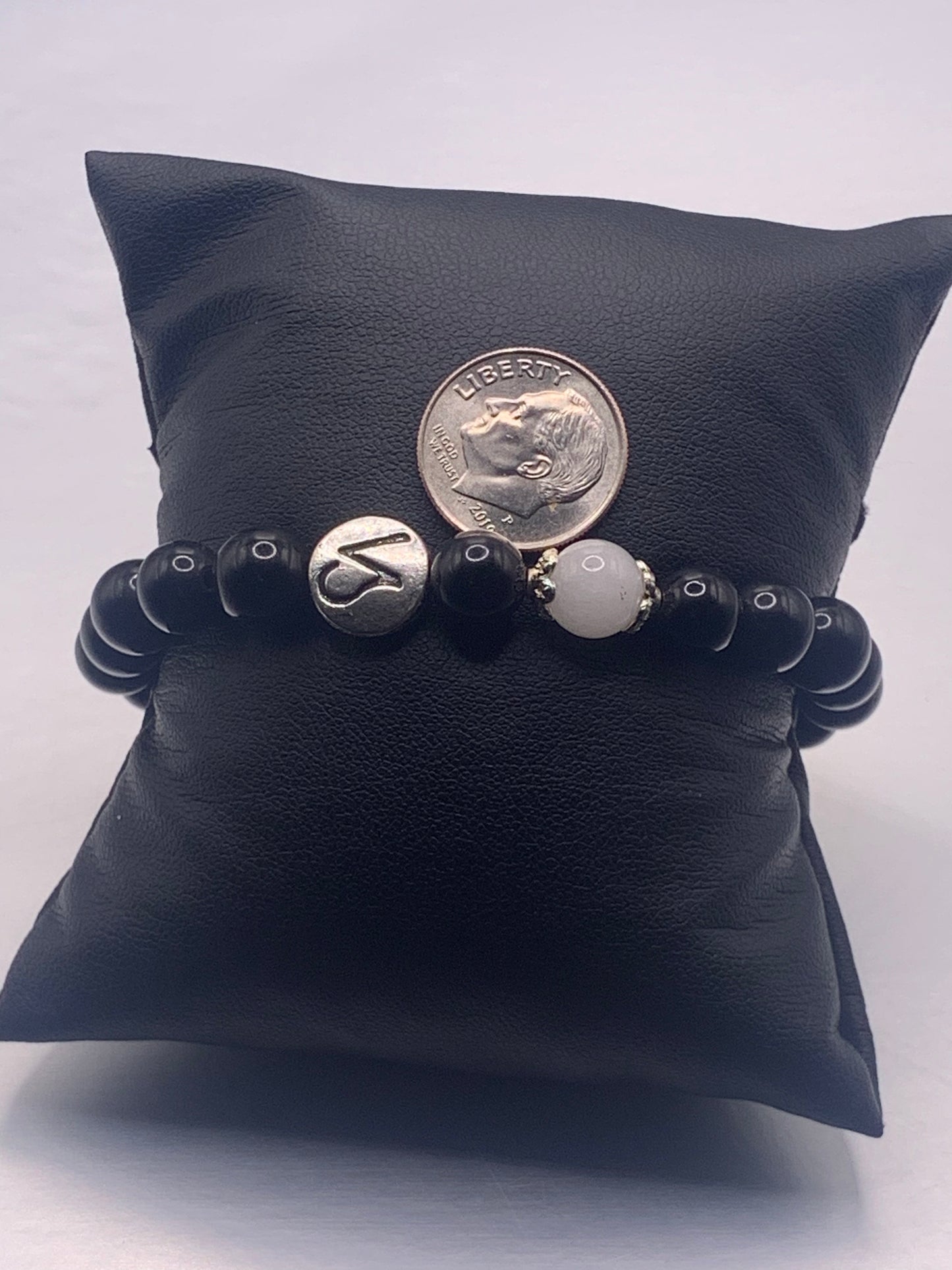 Capricorn Zodiac black obsidian with white chalcedony elastic beaded bracelet with silver accents