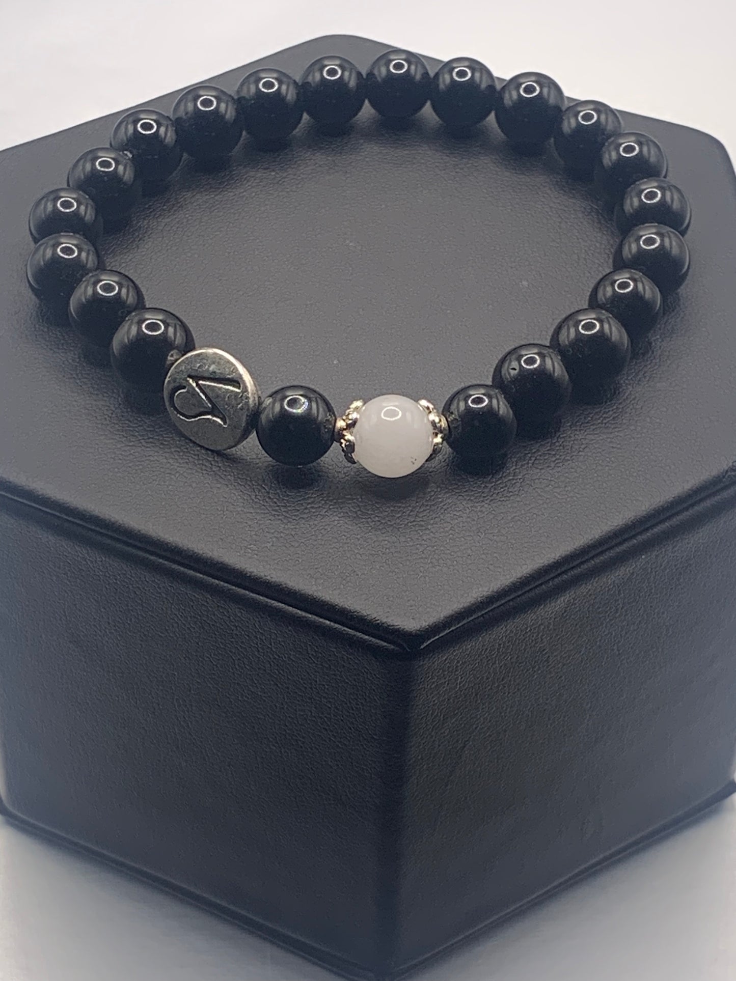 Capricorn Zodiac black obsidian with white chalcedony elastic beaded bracelet with silver accents