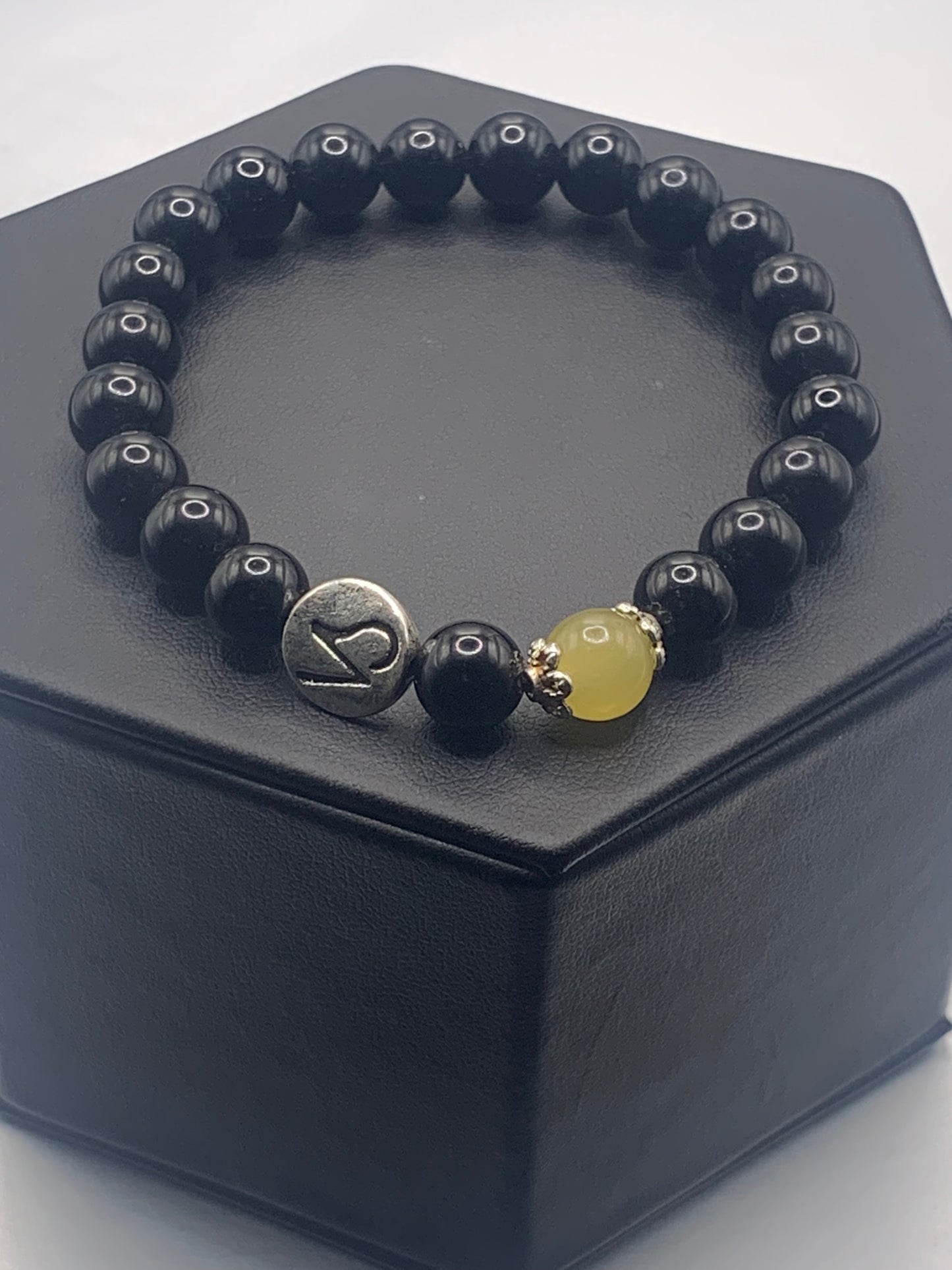 Capricorn Zodiac black obsidian with yellow agate elastic beaded bracelet with silver accents