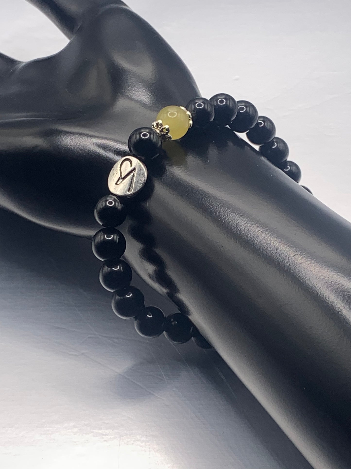 Capricorn Zodiac black obsidian with yellow agate elastic beaded bracelet with silver accents