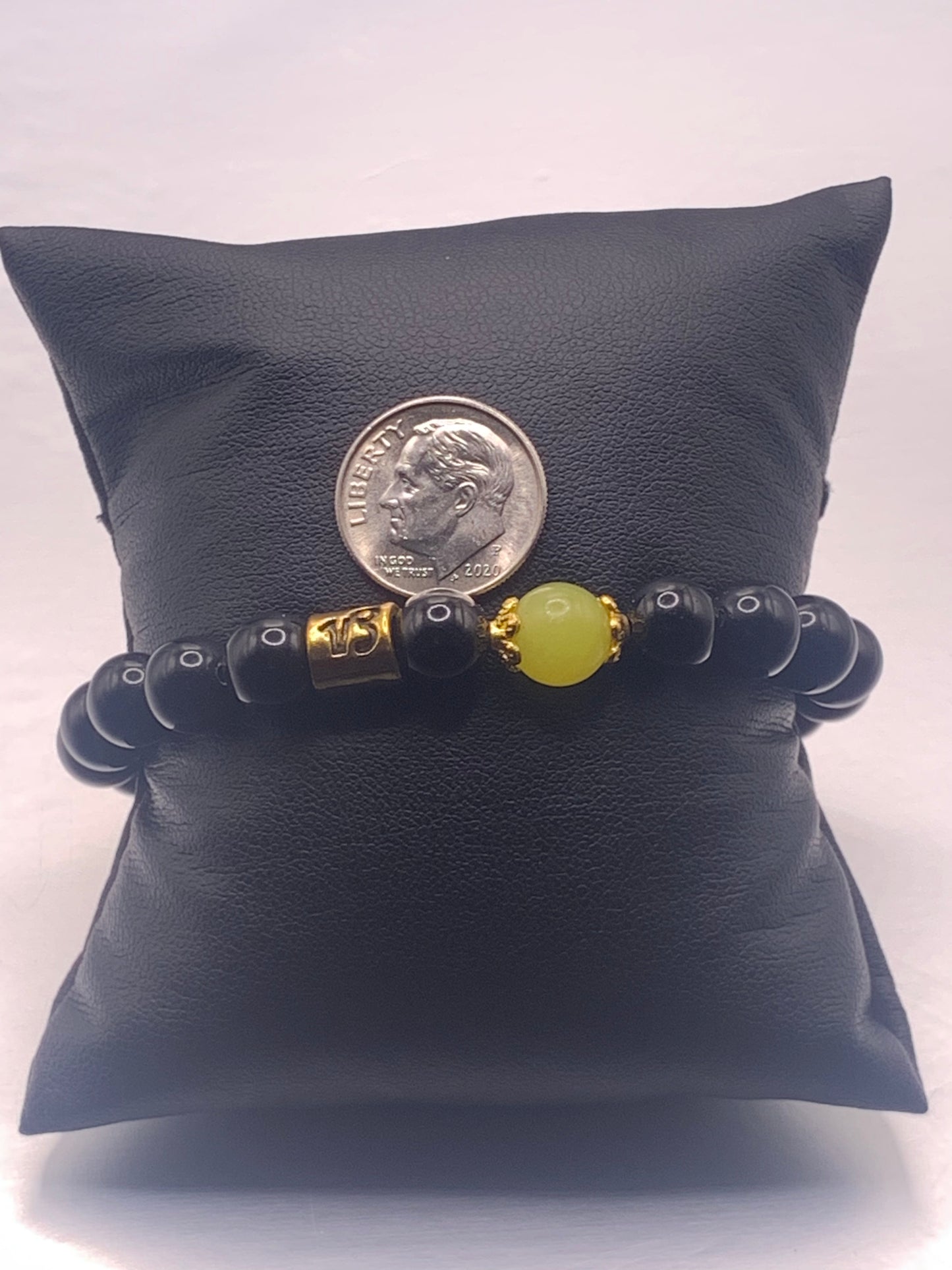 Capricorn Zodiac black obsidian with yellow jade elastic beaded bracelet with gold accents