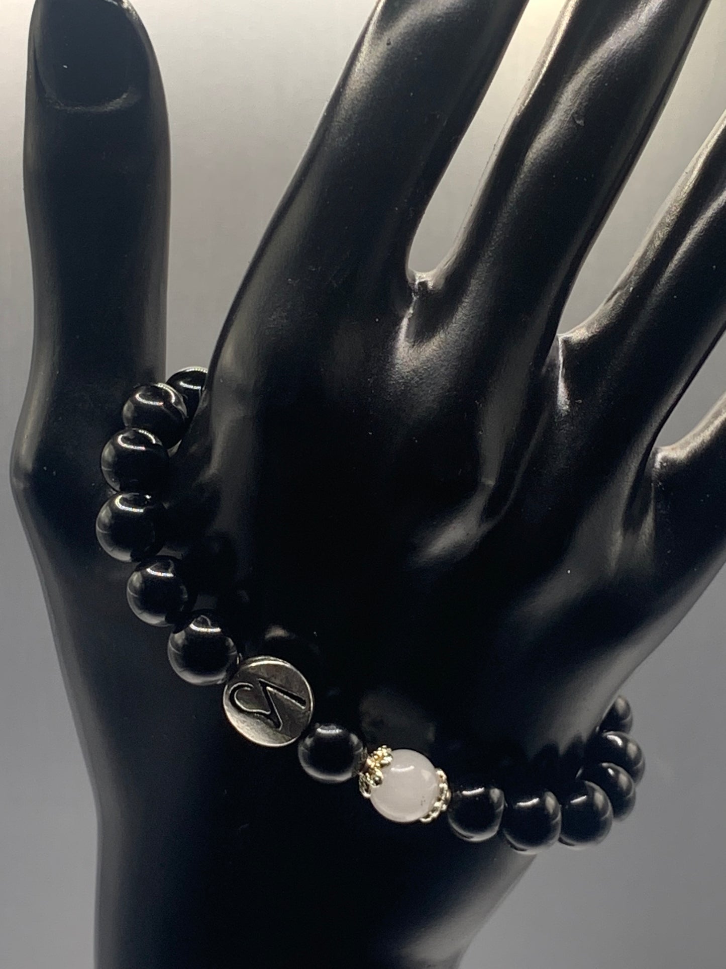 Capricorn Zodiac black obsidian with white chalcedony elastic beaded bracelet with silver accents