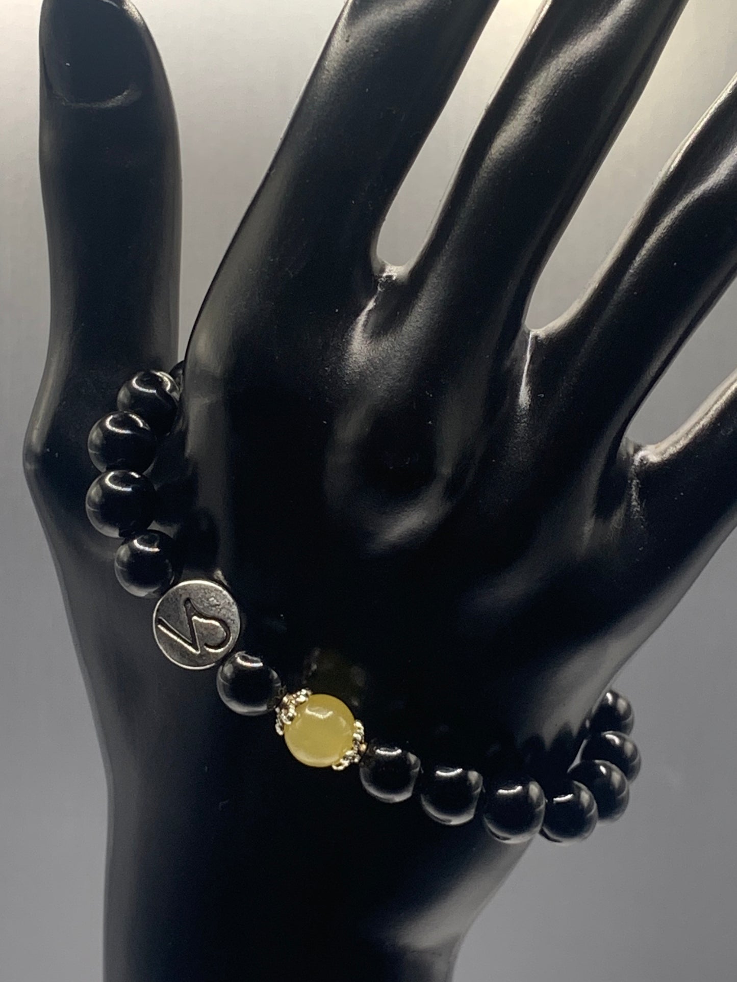 Capricorn Zodiac black obsidian with yellow agate elastic beaded bracelet with silver accents