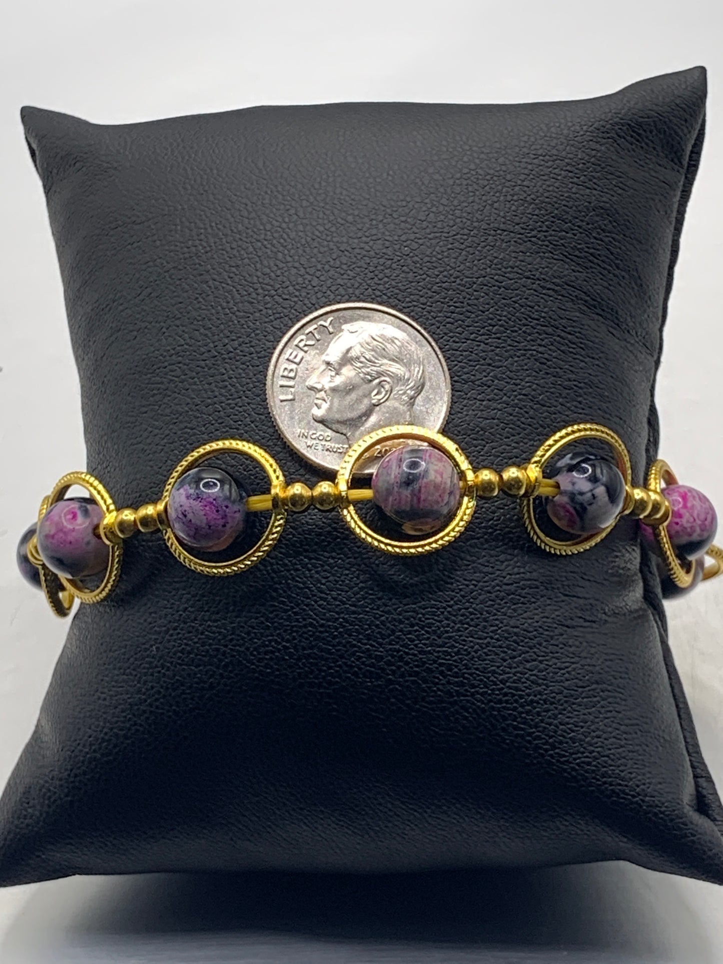 Pink orca agate semi precious stone/crystal elastic beaded bracelet with gold colored rings
