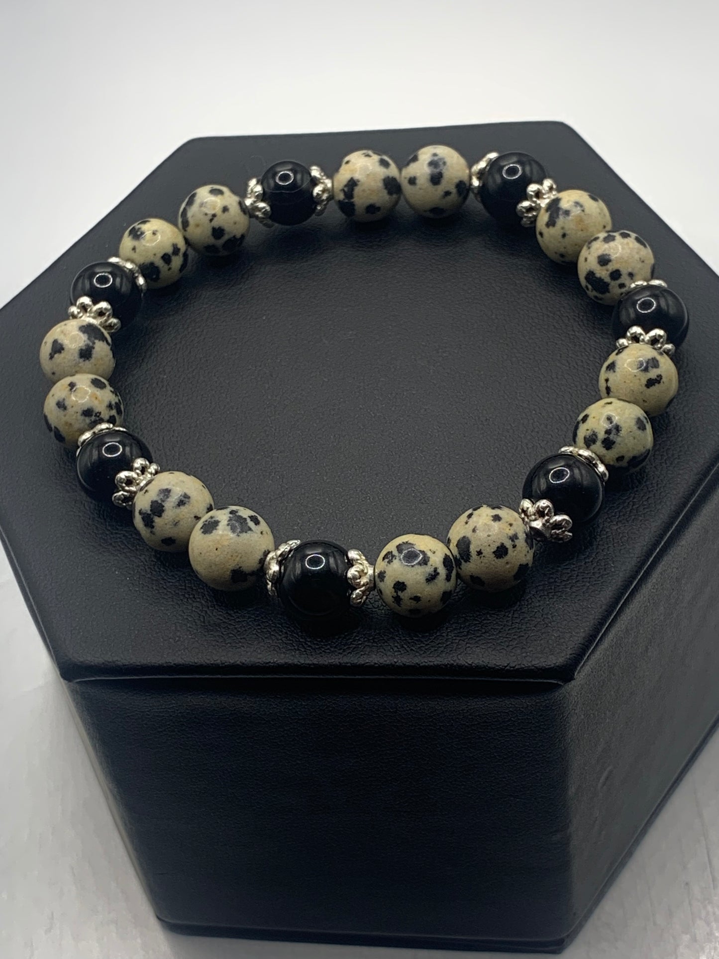 Black obsidian with dalmatian jasper semi precious stone/crystal beaded elastic bracelet with silver plated flower bead caps