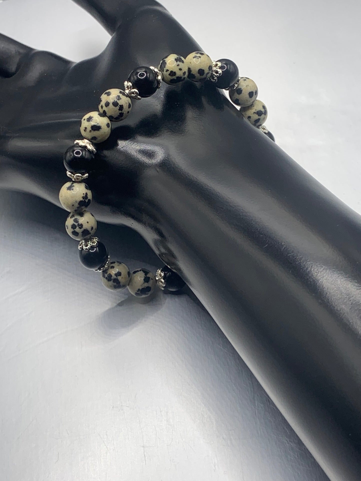 Black obsidian with dalmatian jasper semi precious stone/crystal beaded elastic bracelet with silver plated flower bead caps