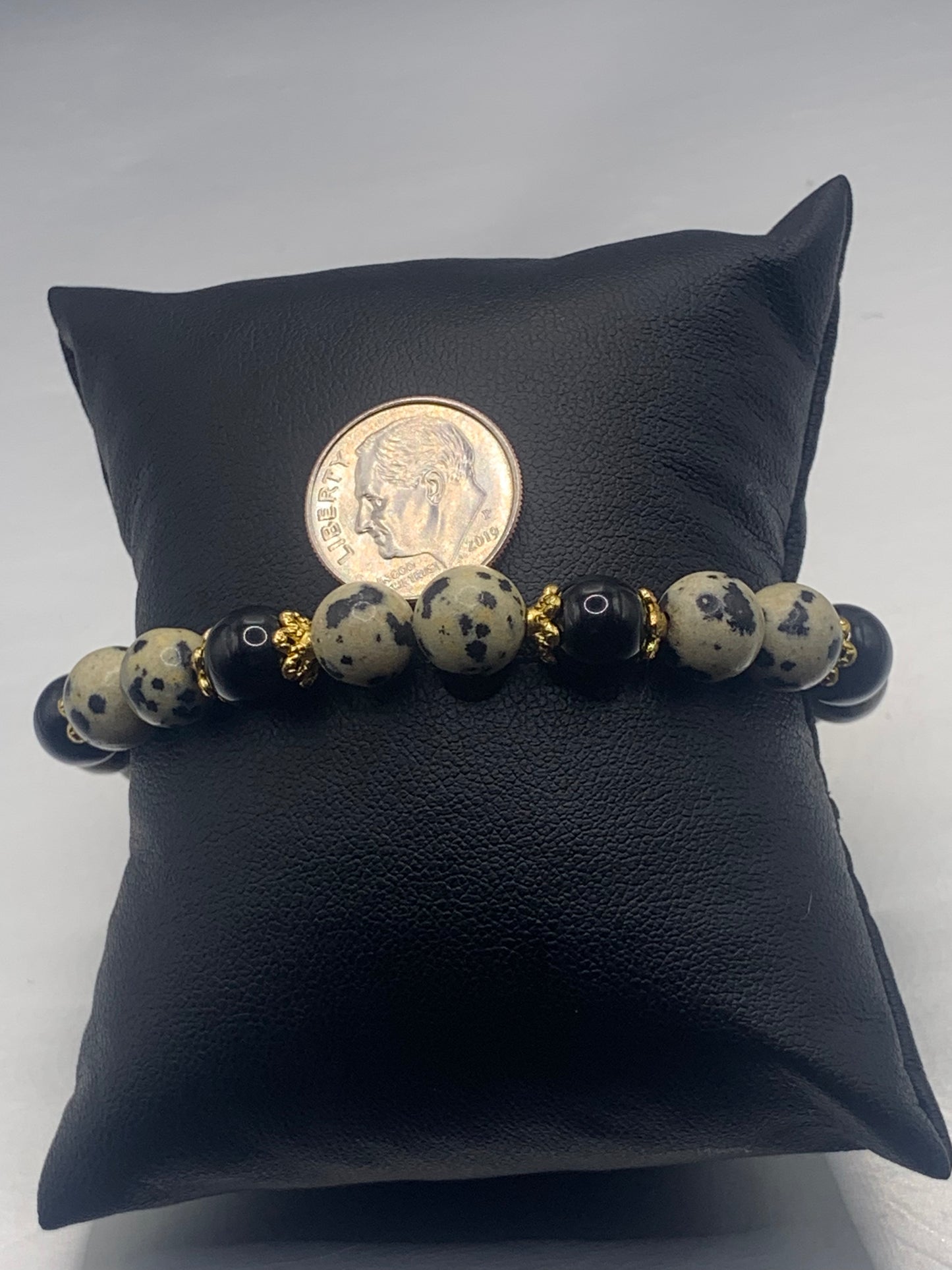 Black obsidian with dalmatian jasper semi precious stone/crystal beaded elastic bracelet with gold plated flower bead caps