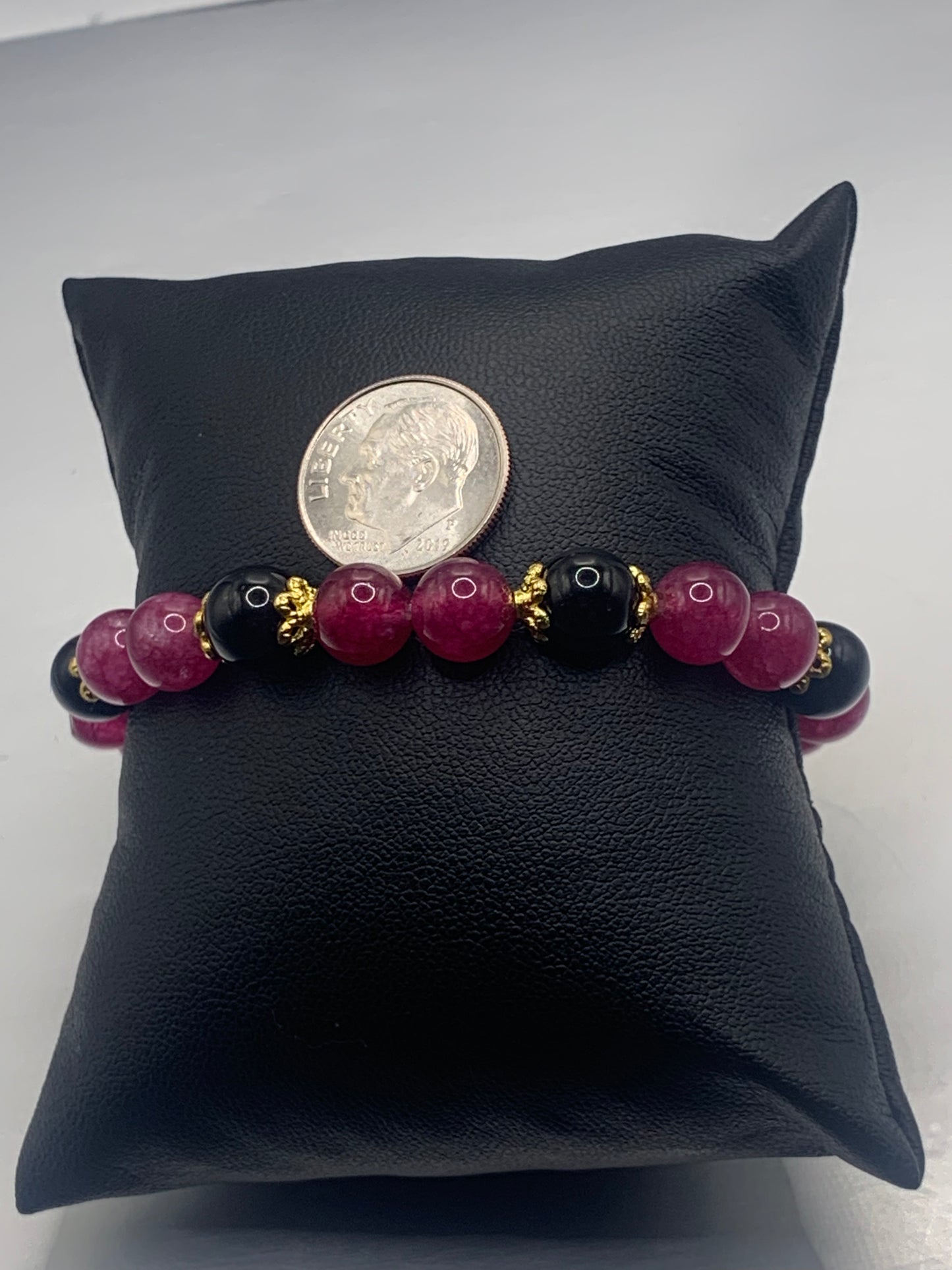 Black obsidian with dark pink chalcedony semi precious stone/crystal beaded elastic bracelet with gold plated flower bead caps