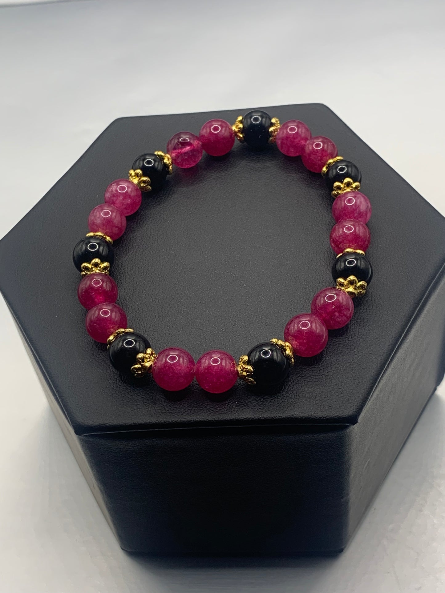 Black obsidian with dark pink chalcedony semi precious stone/crystal beaded elastic bracelet with gold plated flower bead caps