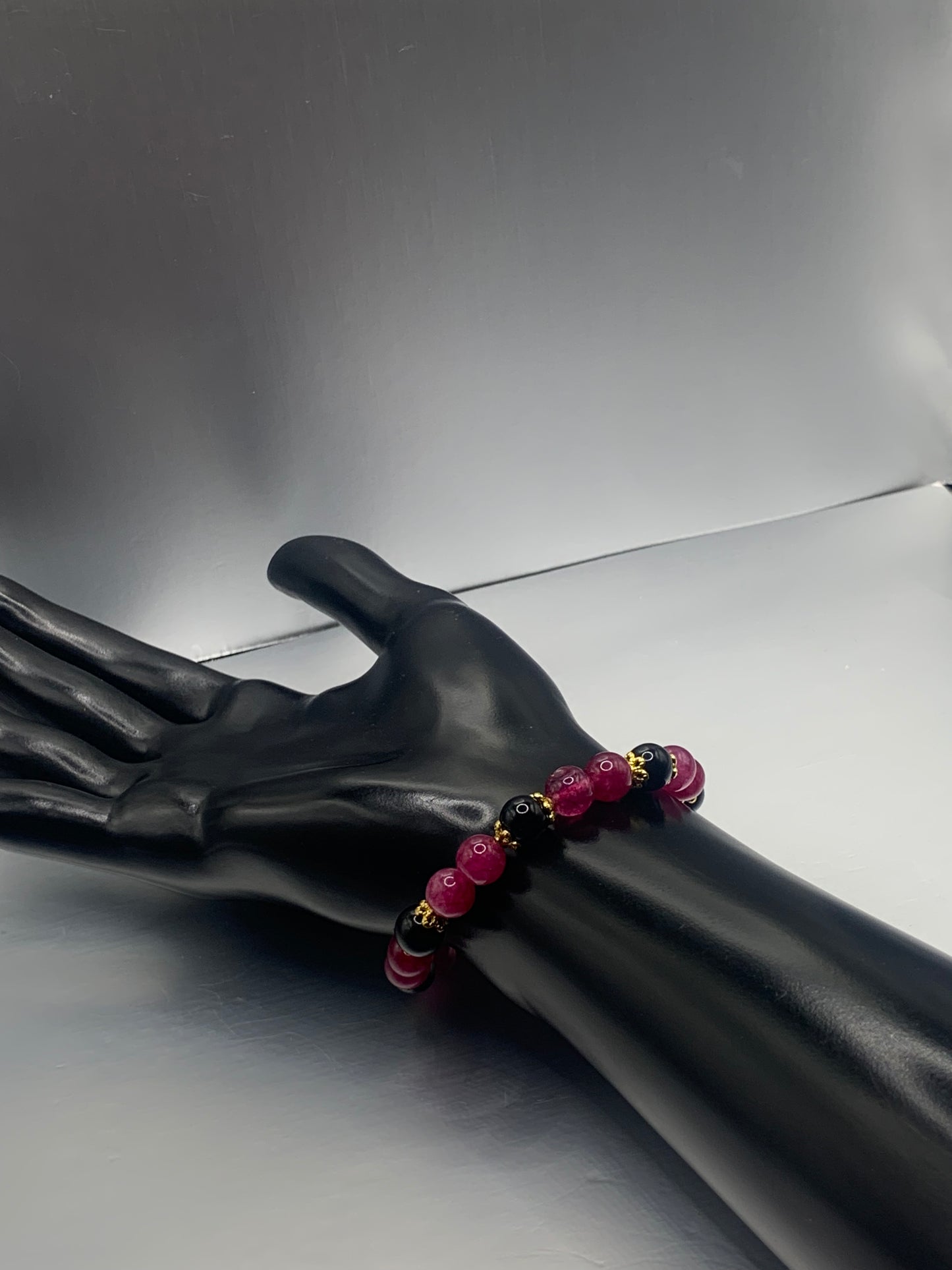 Black obsidian with dark pink chalcedony semi precious stone/crystal beaded elastic bracelet with gold plated flower bead caps