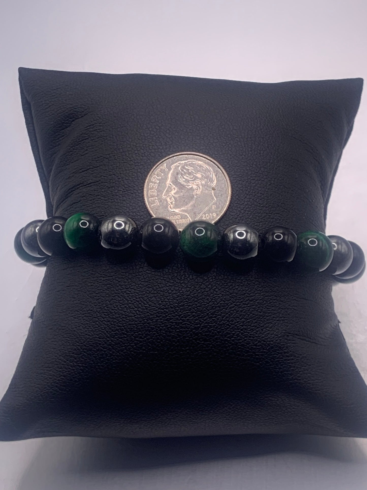 Hematite, black obsidian, and green tigers eye semi precious stone/crystal elastic beaded bracelet