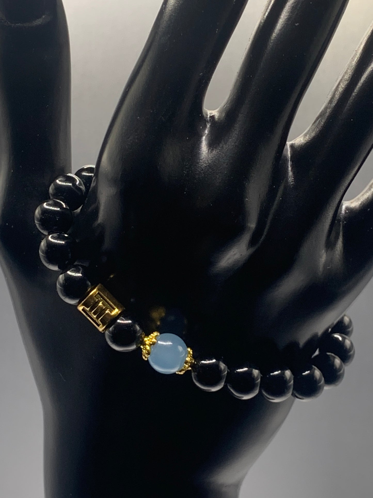 Gemini Zodiac black obsidian with blue agate elastic beaded bracelet with gold accents