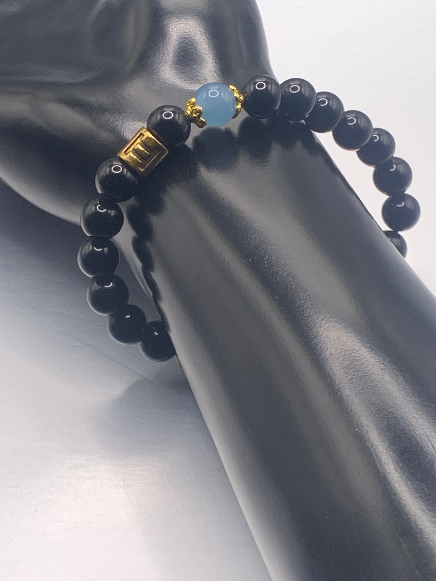 Gemini Zodiac black obsidian with blue agate elastic beaded bracelet with gold accents