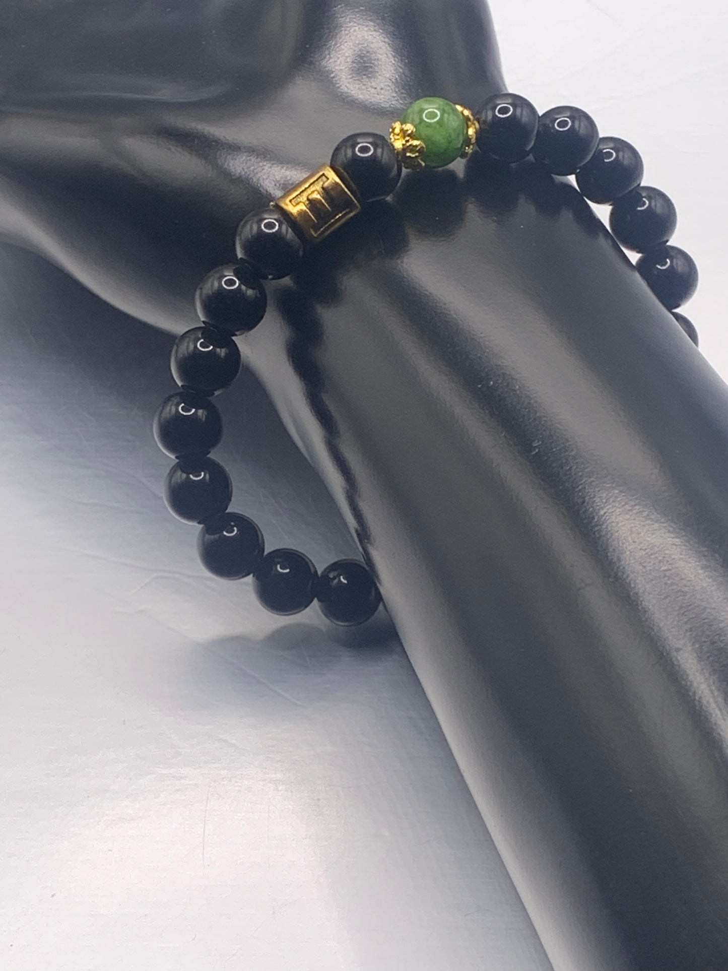 Gemini Zodiac black obsidian with green tourmaline elastic beaded bracelet with gold accents