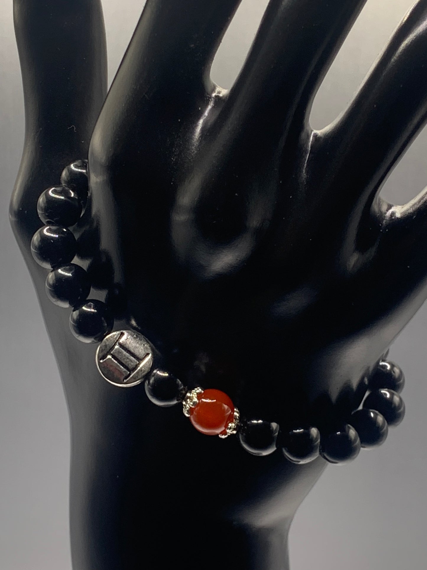 Gemini Zodiac black obsidian with red agate elastic beaded bracelet with silver accents