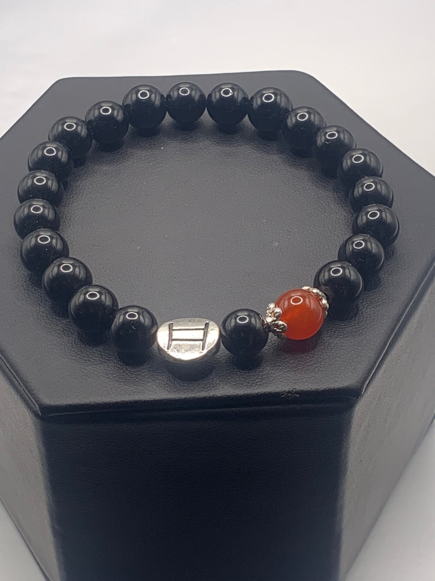Gemini Zodiac black obsidian with red agate elastic beaded bracelet with silver accents