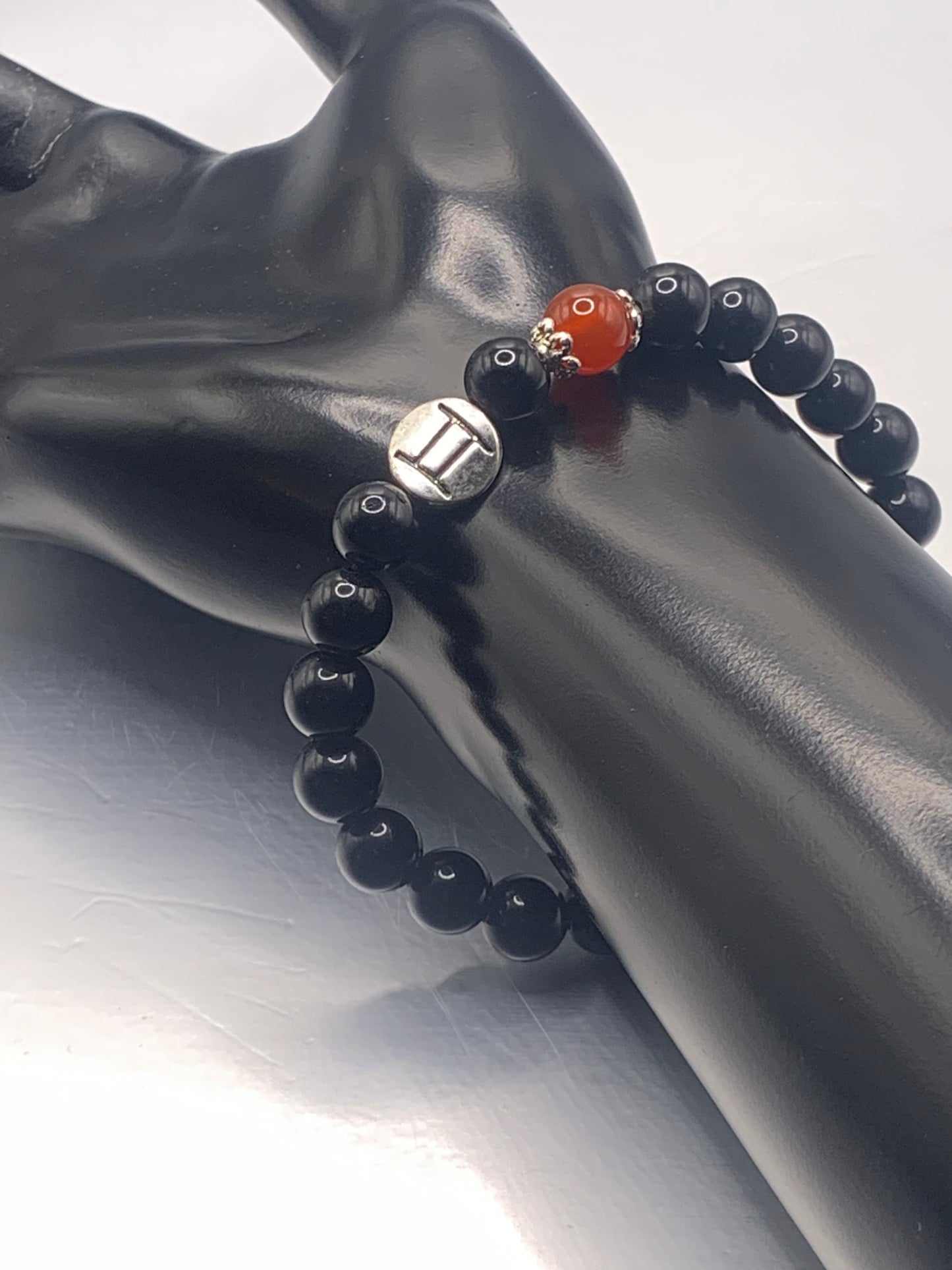 Gemini Zodiac black obsidian with red agate elastic beaded bracelet with silver accents