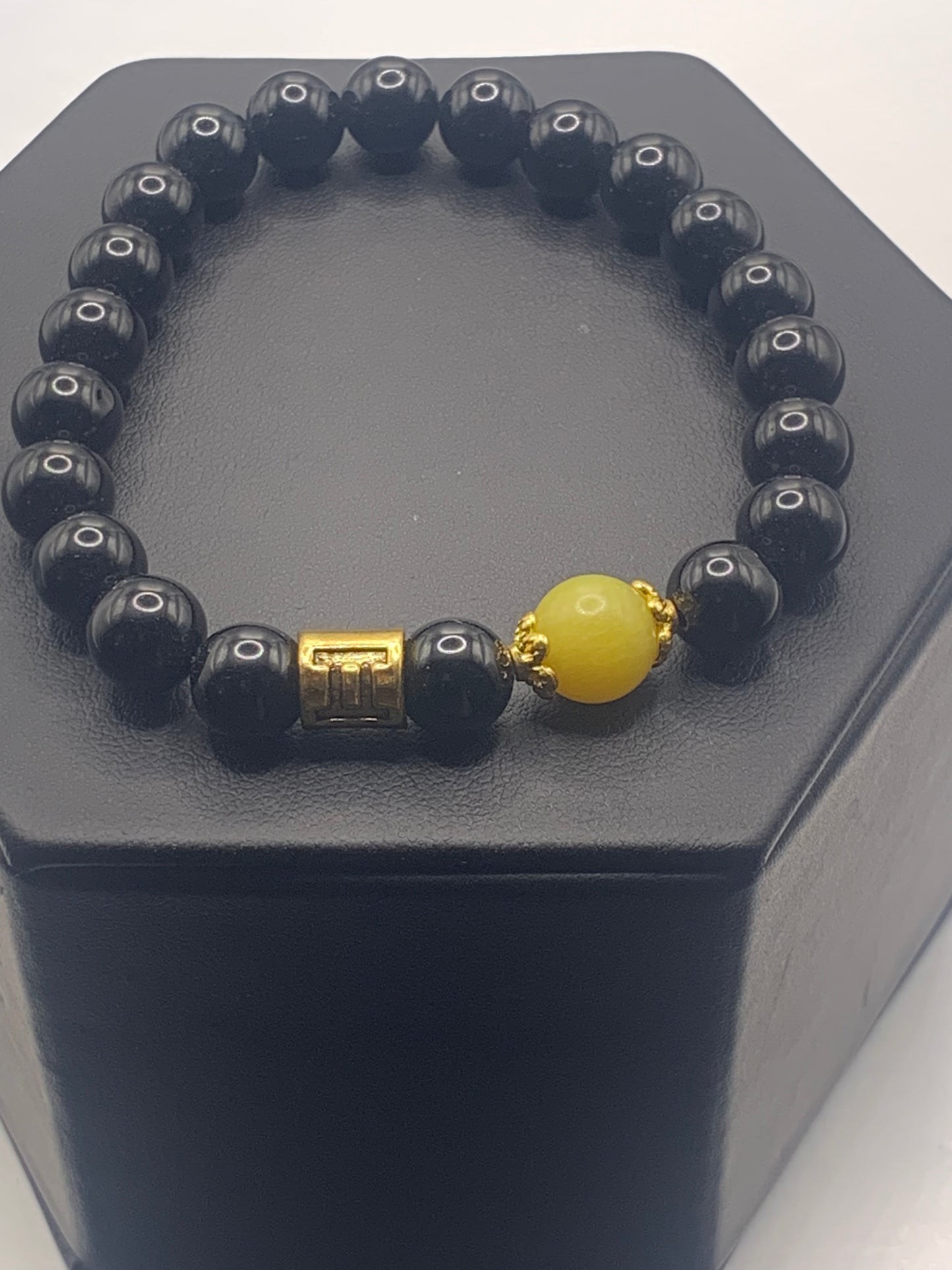 Gemini Zodiac black obsidian with yellow jade elastic beaded bracelet with gold accents