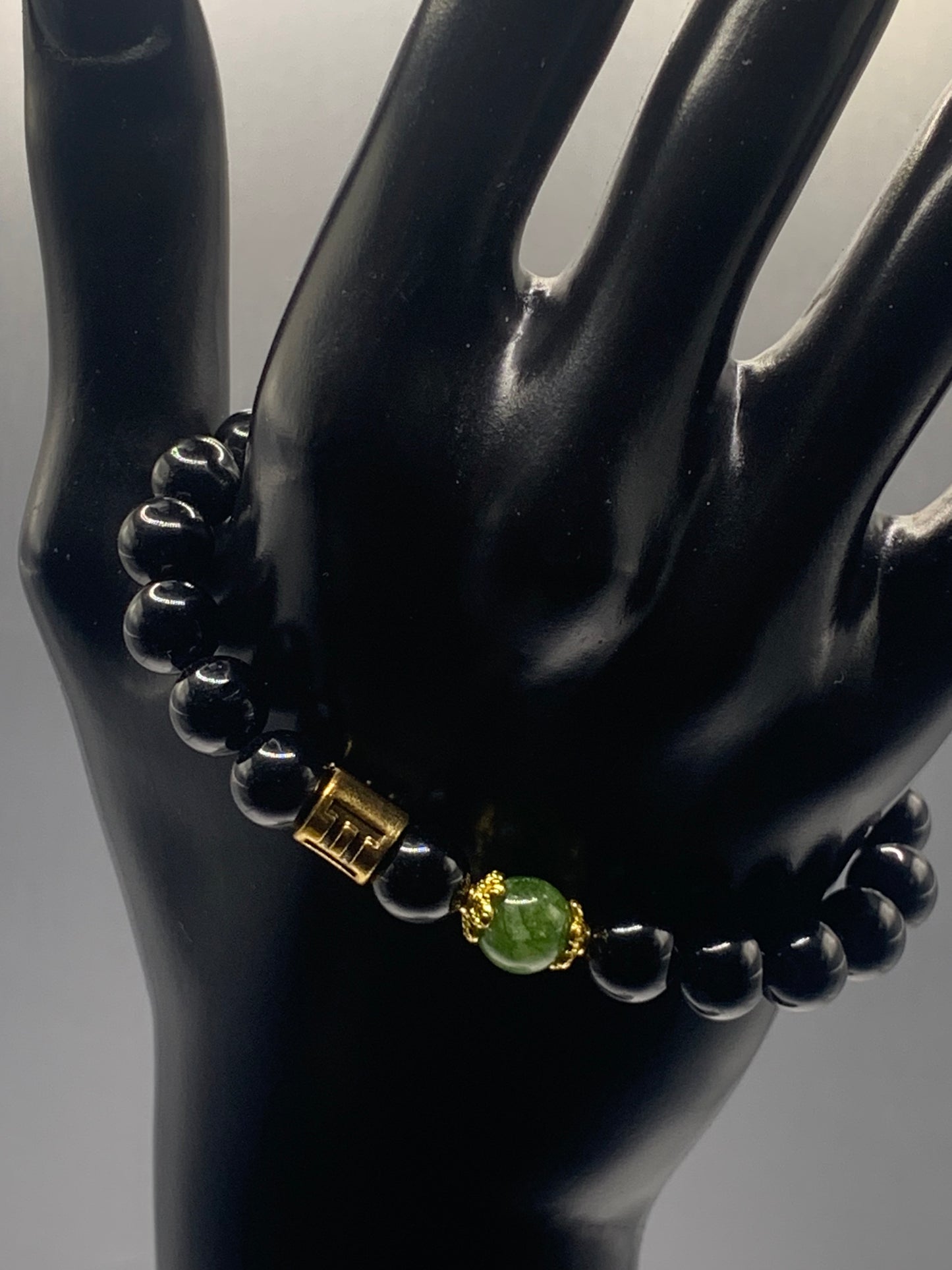 Gemini Zodiac black obsidian with green tourmaline elastic beaded bracelet with gold accents