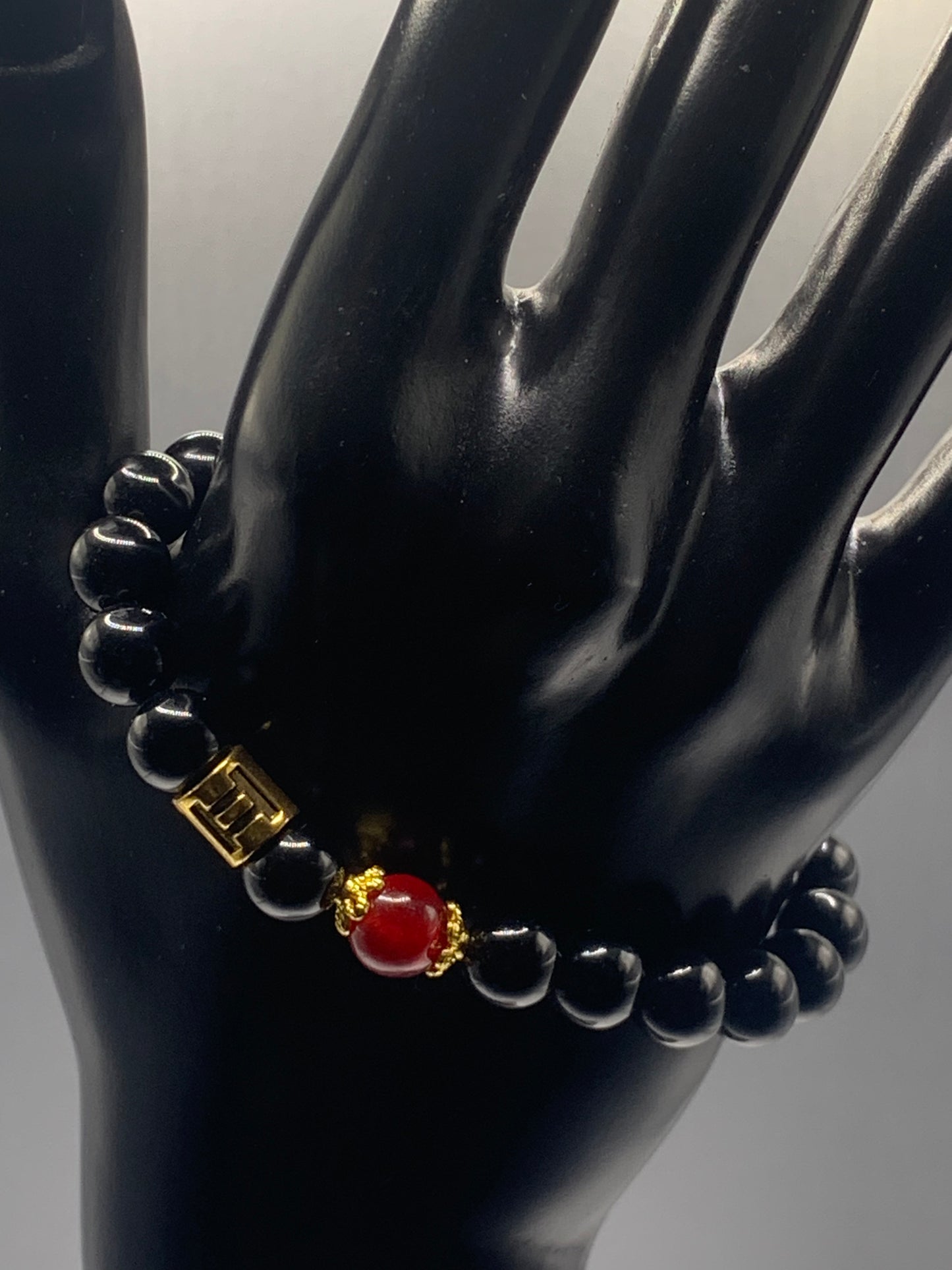 Gemini Zodiac black obsidian with red chalcedony elastic beaded bracelet with gold accents