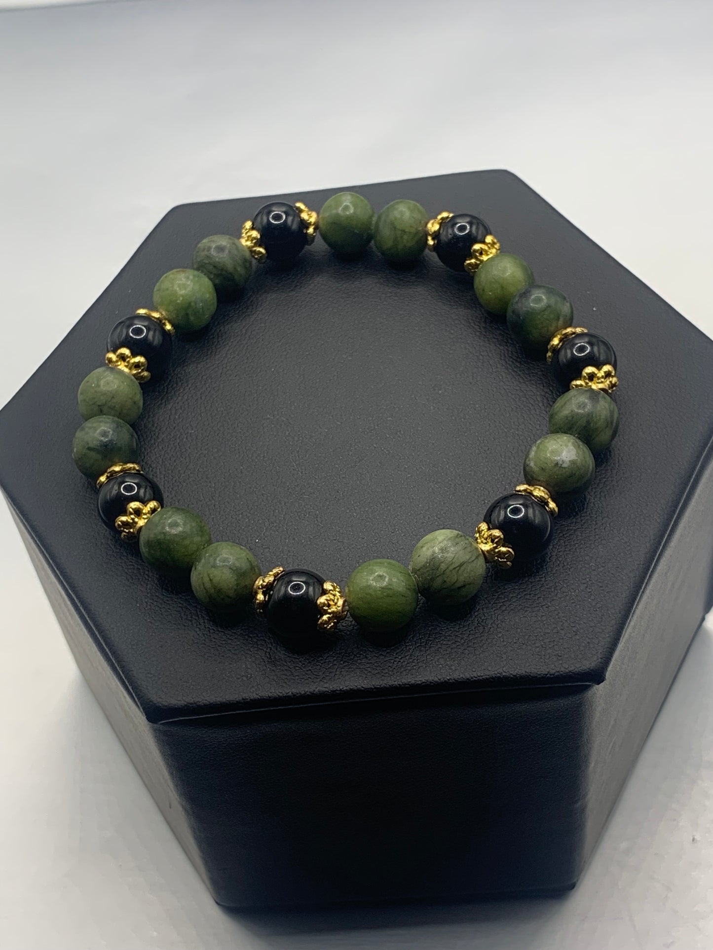Black obsidian with green jade semi precious stone/crystal beaded elastic bracelet with gold plated flower bead caps