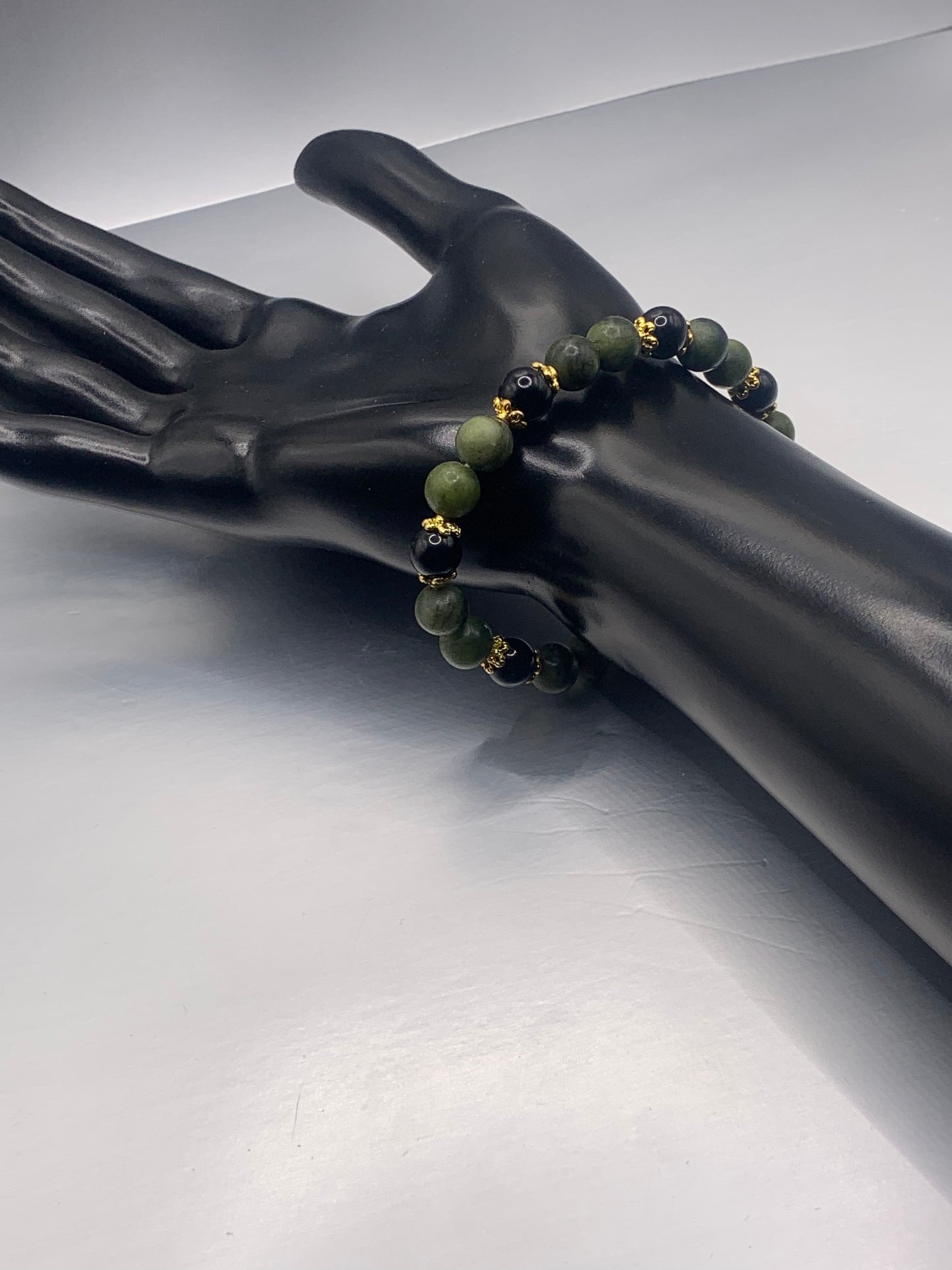 Black obsidian with green jade semi precious stone/crystal beaded elastic bracelet with gold plated flower bead caps