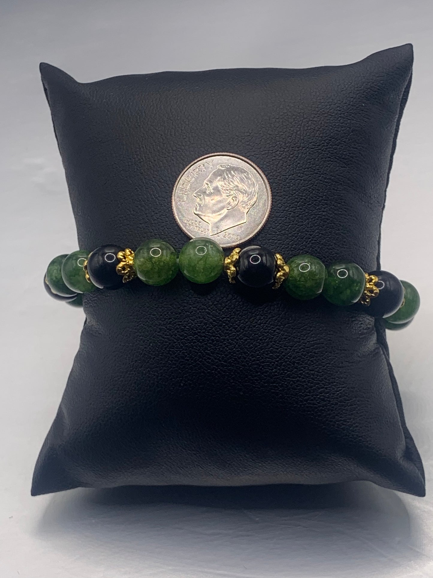 Black obsidian with green tourmaline semi precious stone/crystal beaded elastic bracelet with gold plated flower bead caps