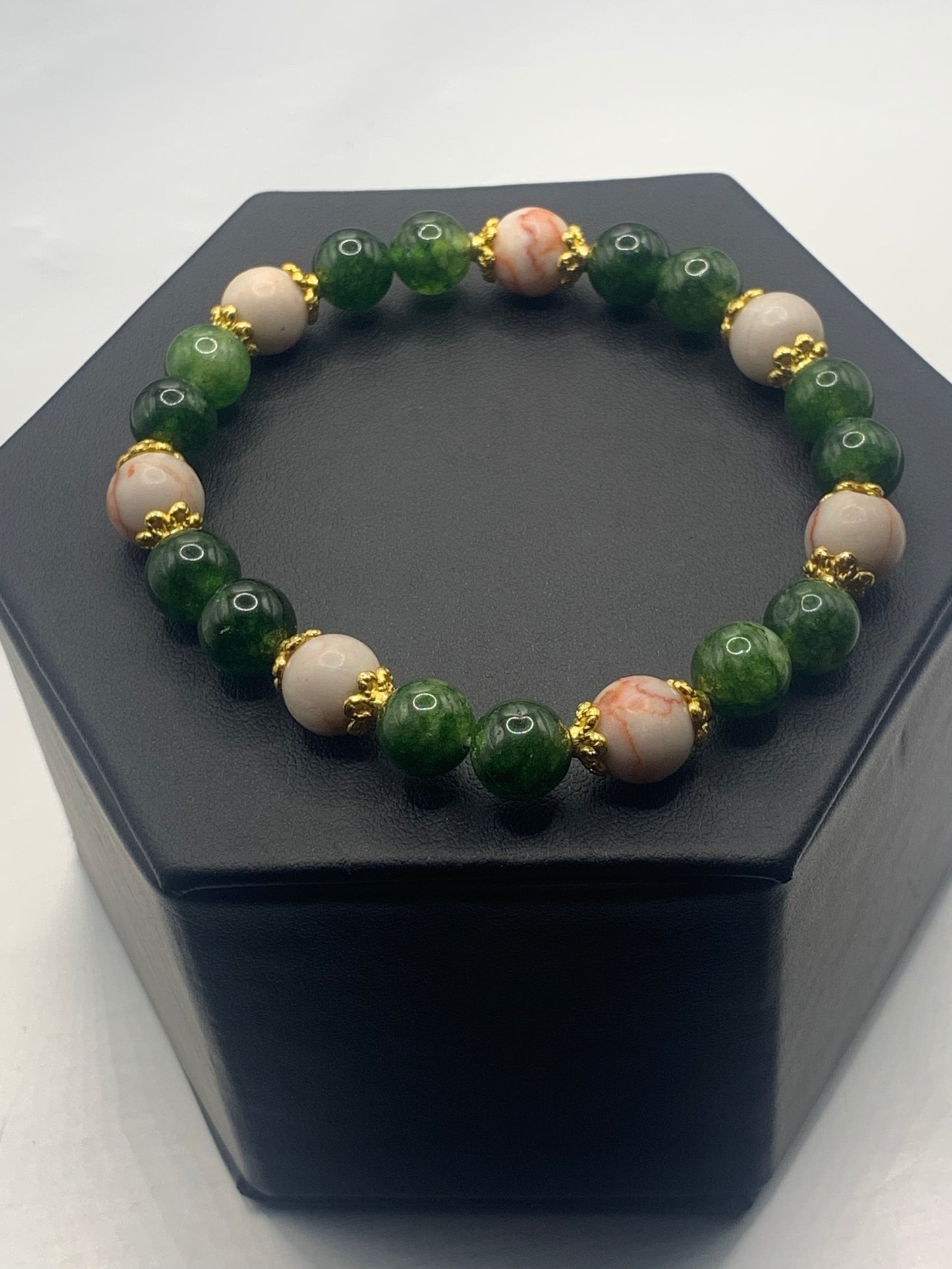 Red vein jasper and green tourmaline semi precious stone/crystal elastic beaded bracelet with gold plated flower bead caps