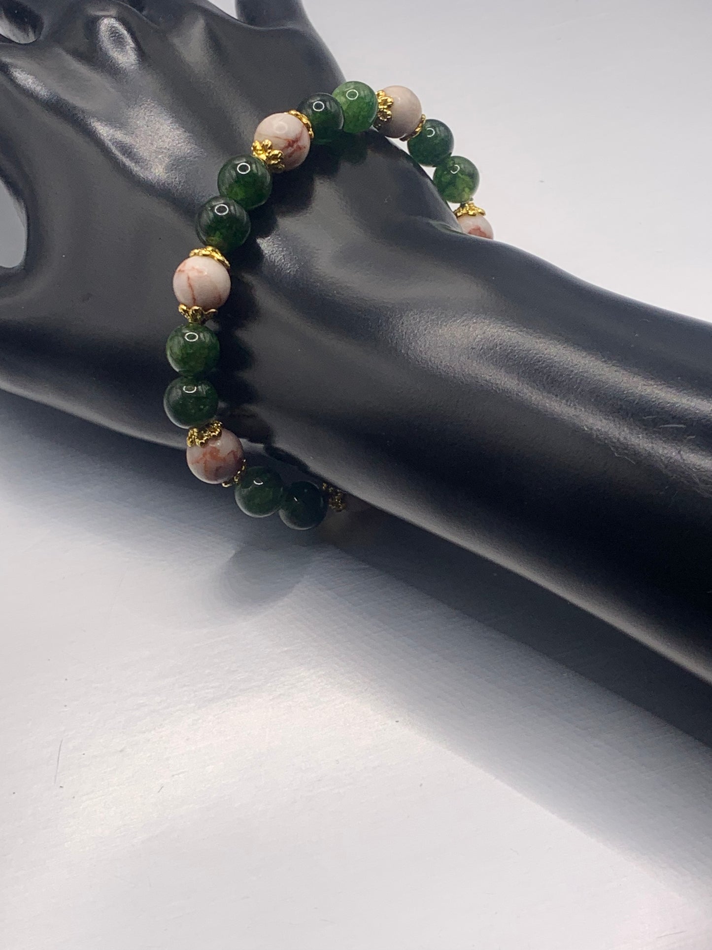 Red vein jasper and green tourmaline semi precious stone/crystal elastic beaded bracelet with gold plated flower bead caps