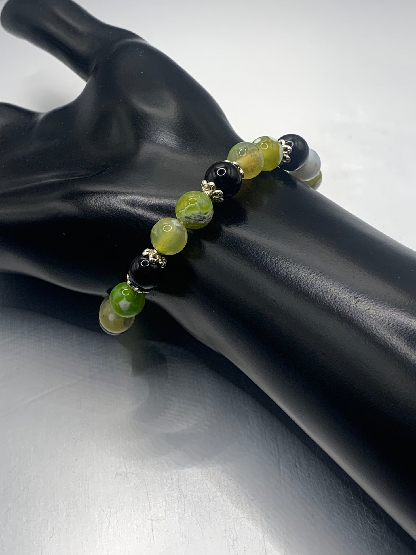 Black obsidian with yellow green white orca agate semi precious stone/crystal beaded elastic bracelet with silver plated flower bead caps