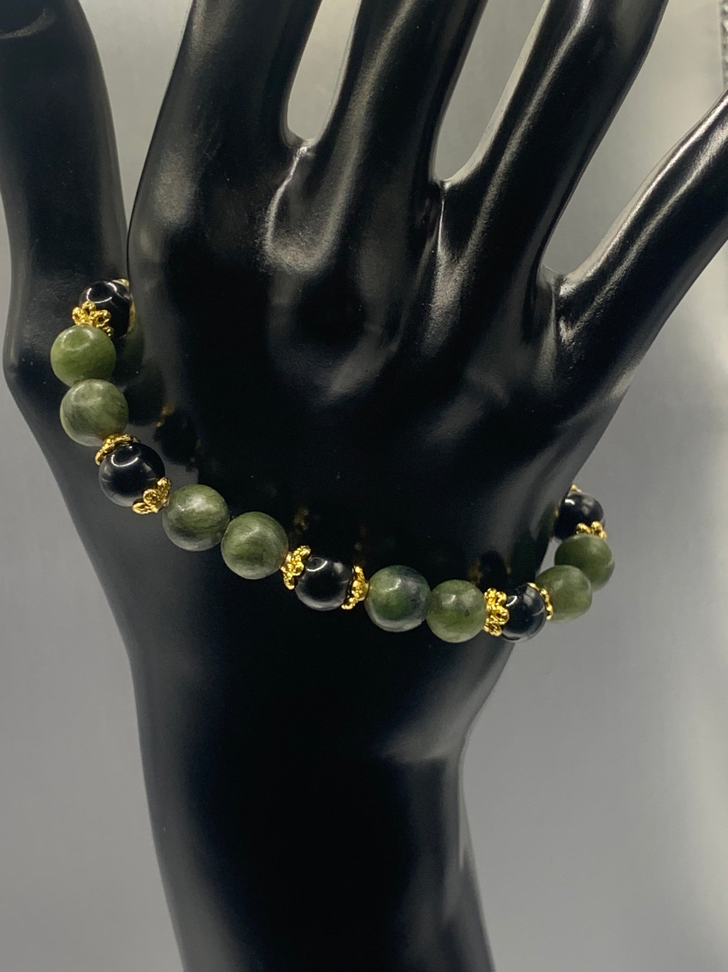 Black obsidian with green jade semi precious stone/crystal beaded elastic bracelet with gold plated flower bead caps