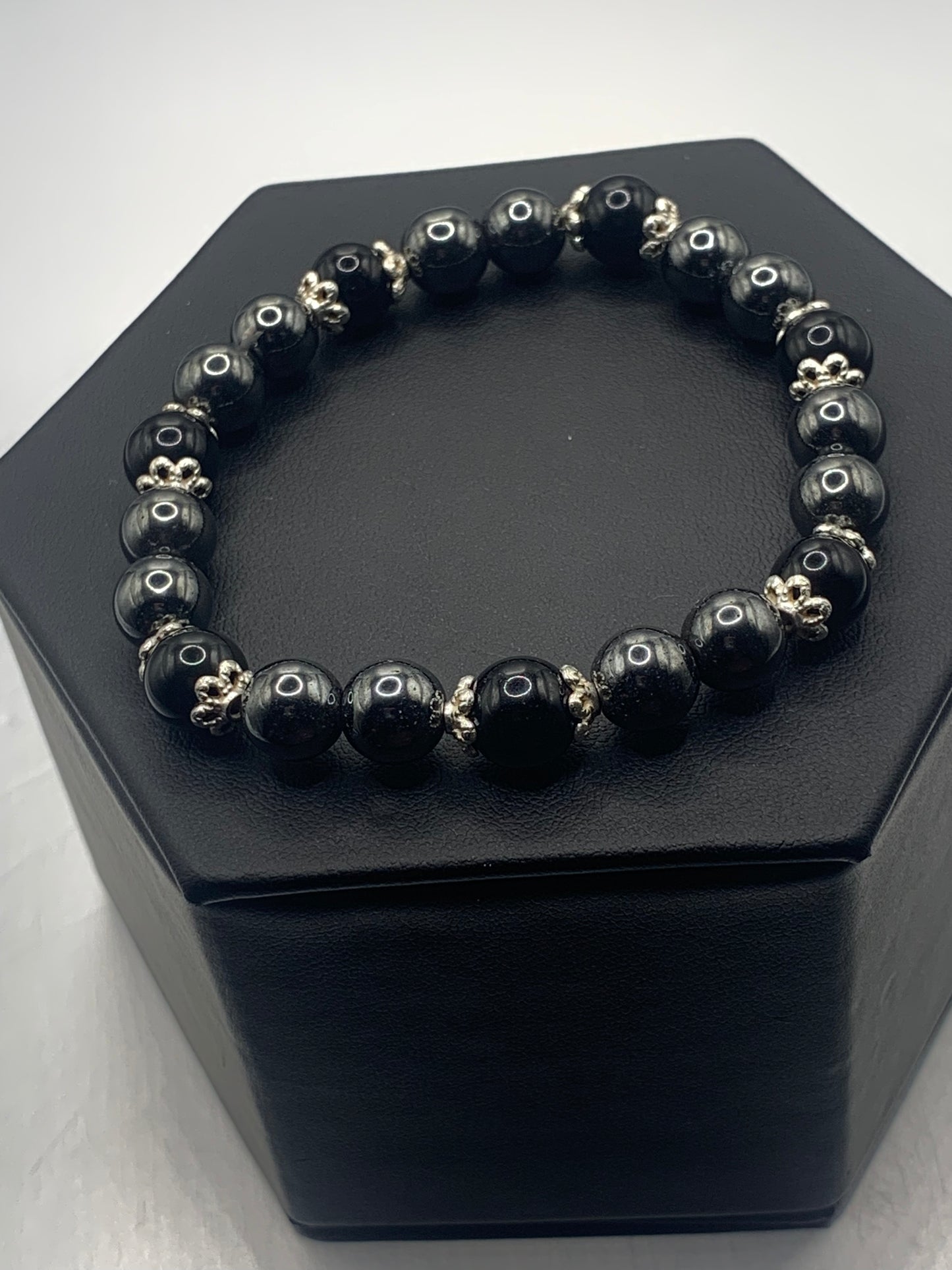 Black obsidian with hematite semi precious stone/crystal beaded elastic bracelet with silver plated flower bead caps