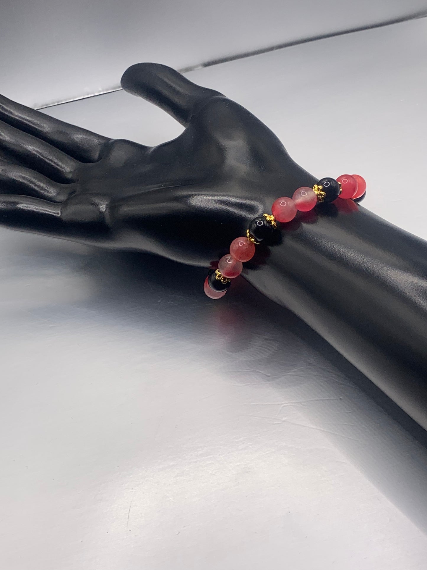 Black obsidian with hot pink agate semi precious stone/crystal beaded elastic bracelet with gold plated flower bead caps