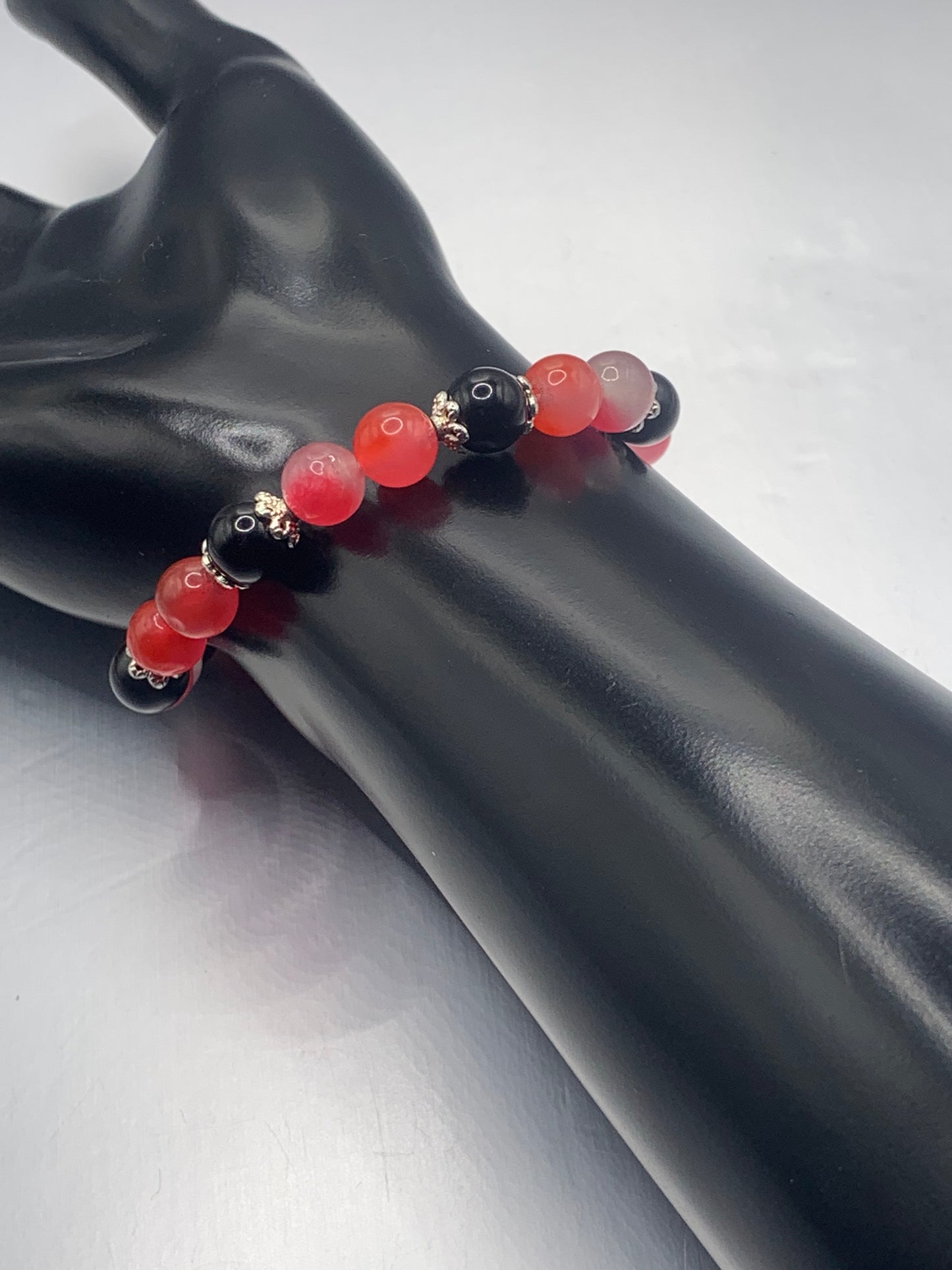 Black obsidian with hot pink agate semi precious stone/crystal beaded elastic bracelet with silver plated flower bead caps