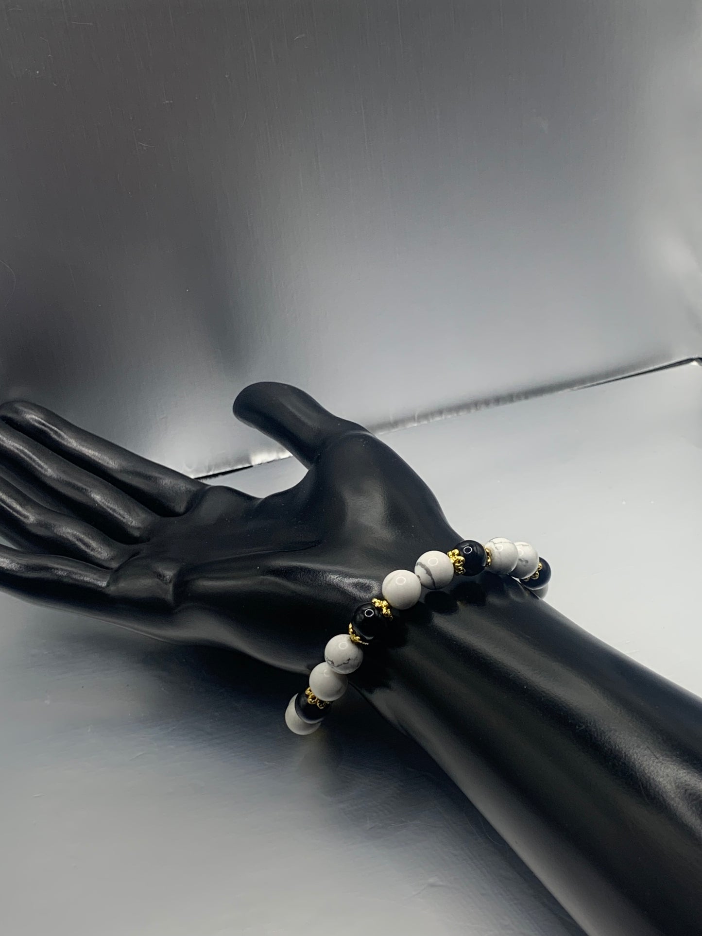Black obsidian with howlite semi precious stone/crystal beaded elastic bracelet with gold plated flower bead caps