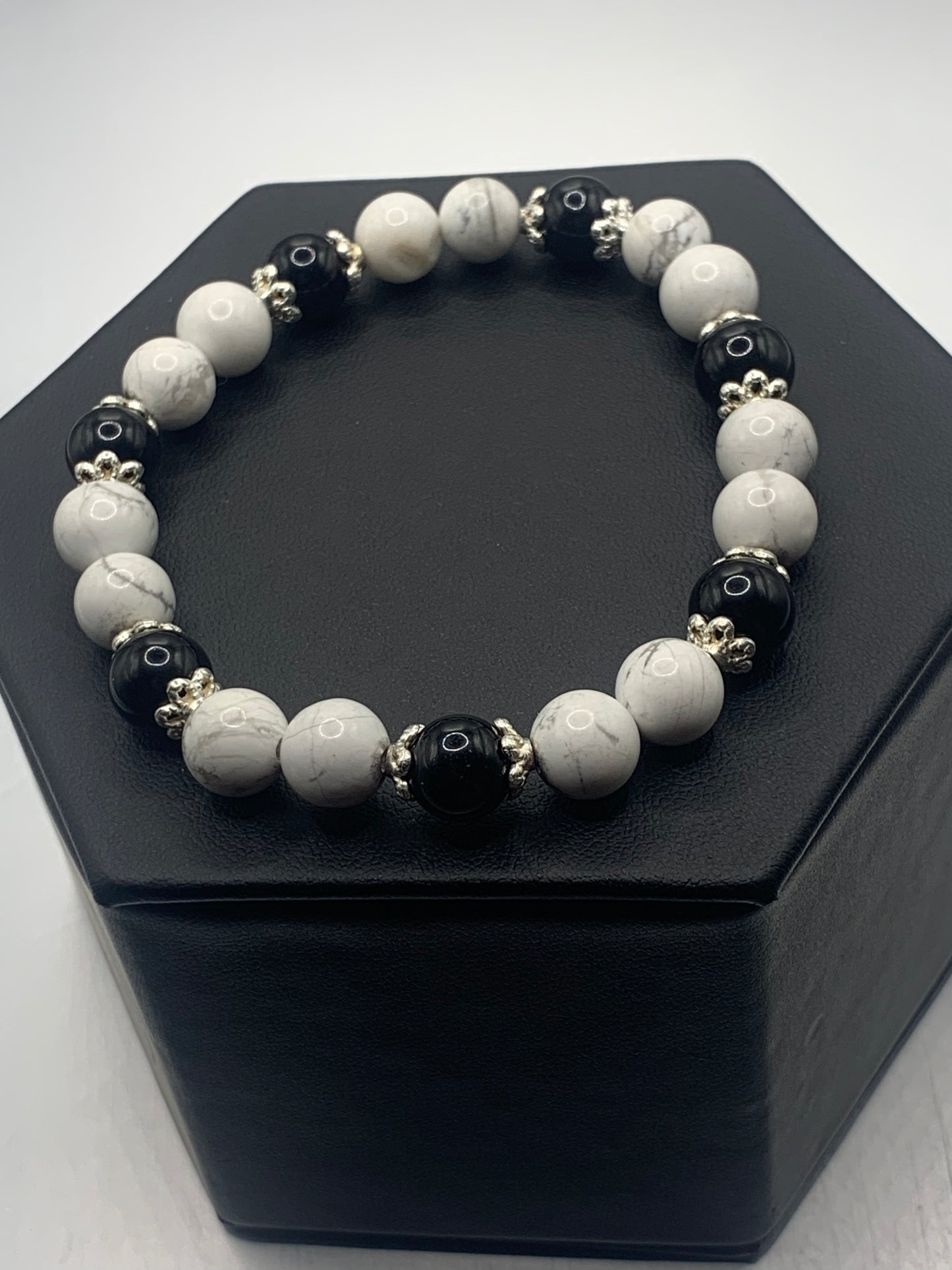 Black obsidian with howlite semi precious stone/crystal beaded elastic bracelet with silver plated flower bead caps