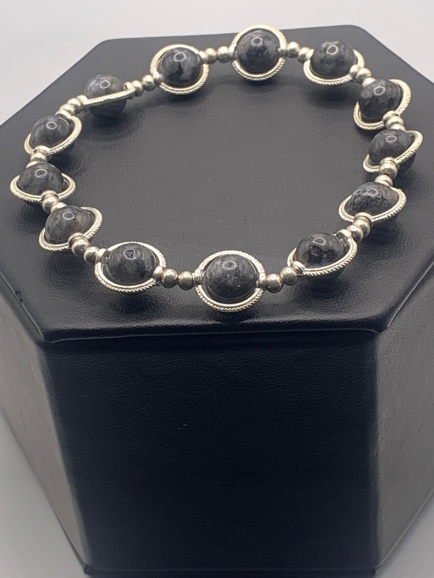 Larvikite semi precious stone/crystal elastic beaded bracelet with silver colored rings