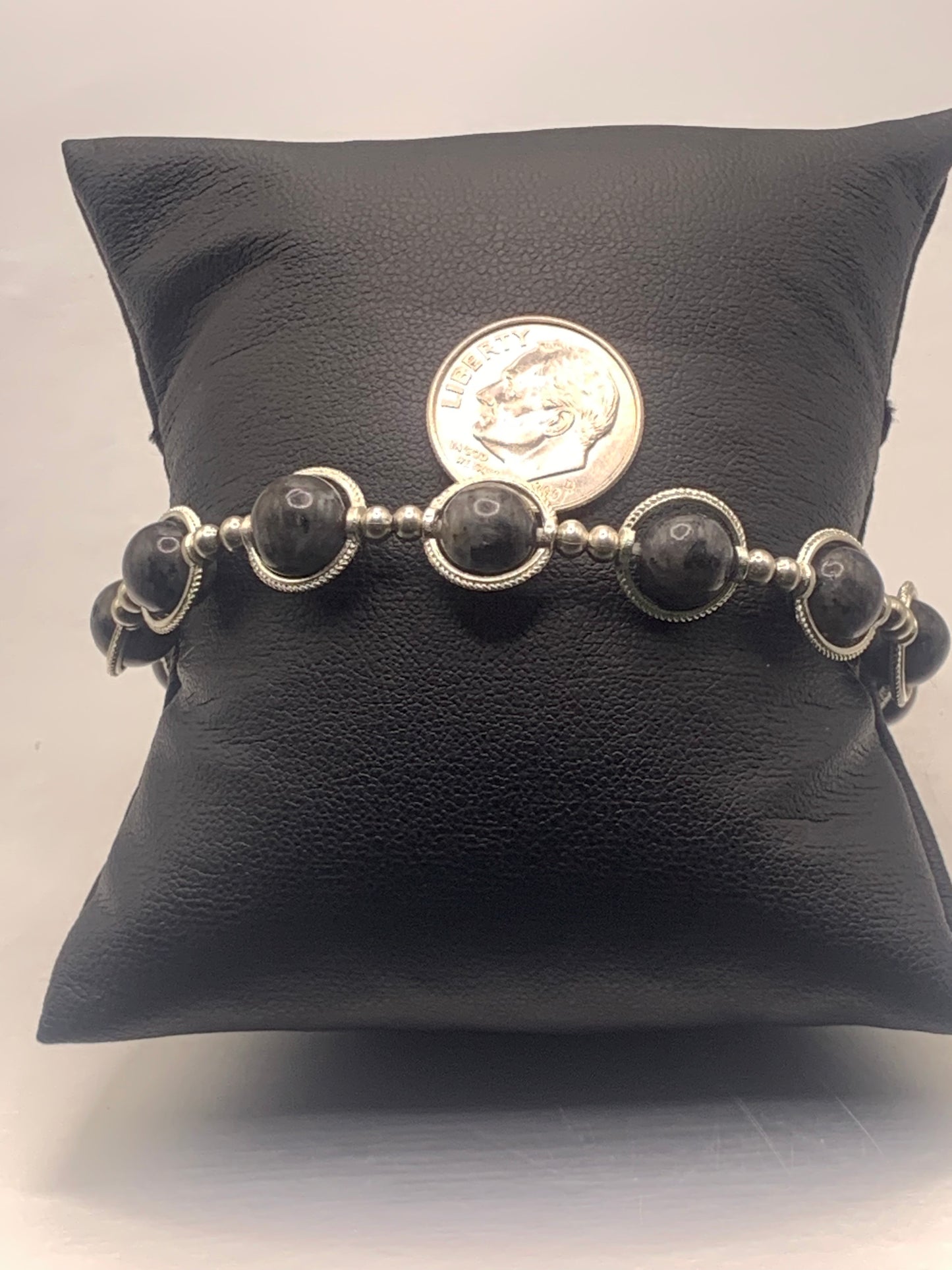 Larvikite semi precious stone/crystal elastic beaded bracelet with silver colored rings