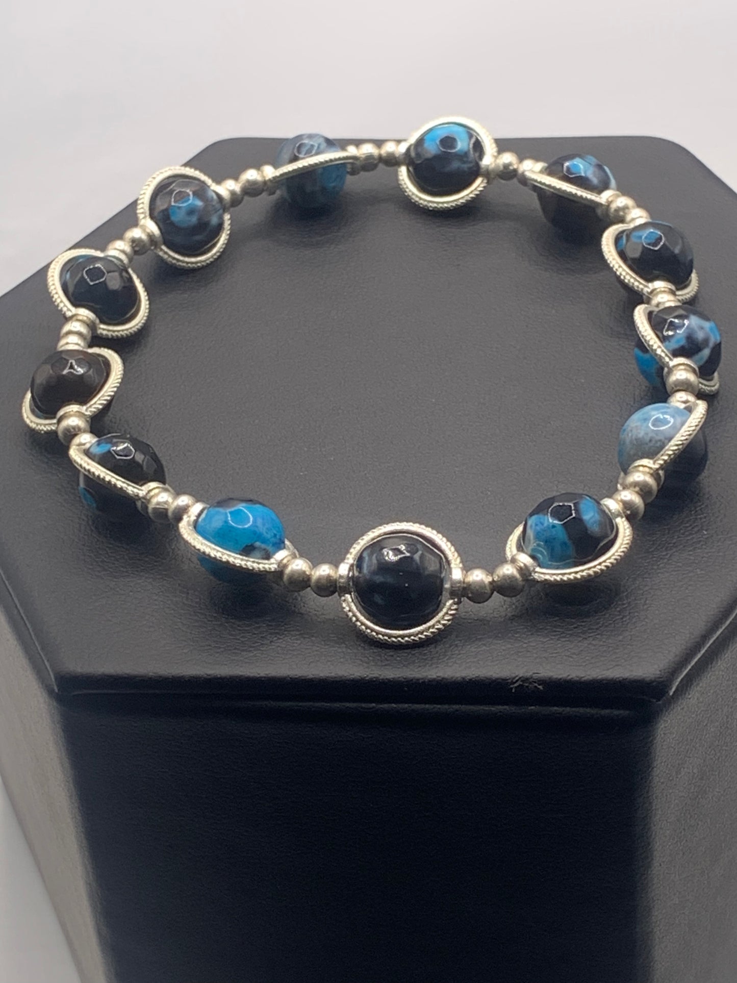 Blue orca agate semi precious stone/crystal elastic beaded bracelet with silver colored rings