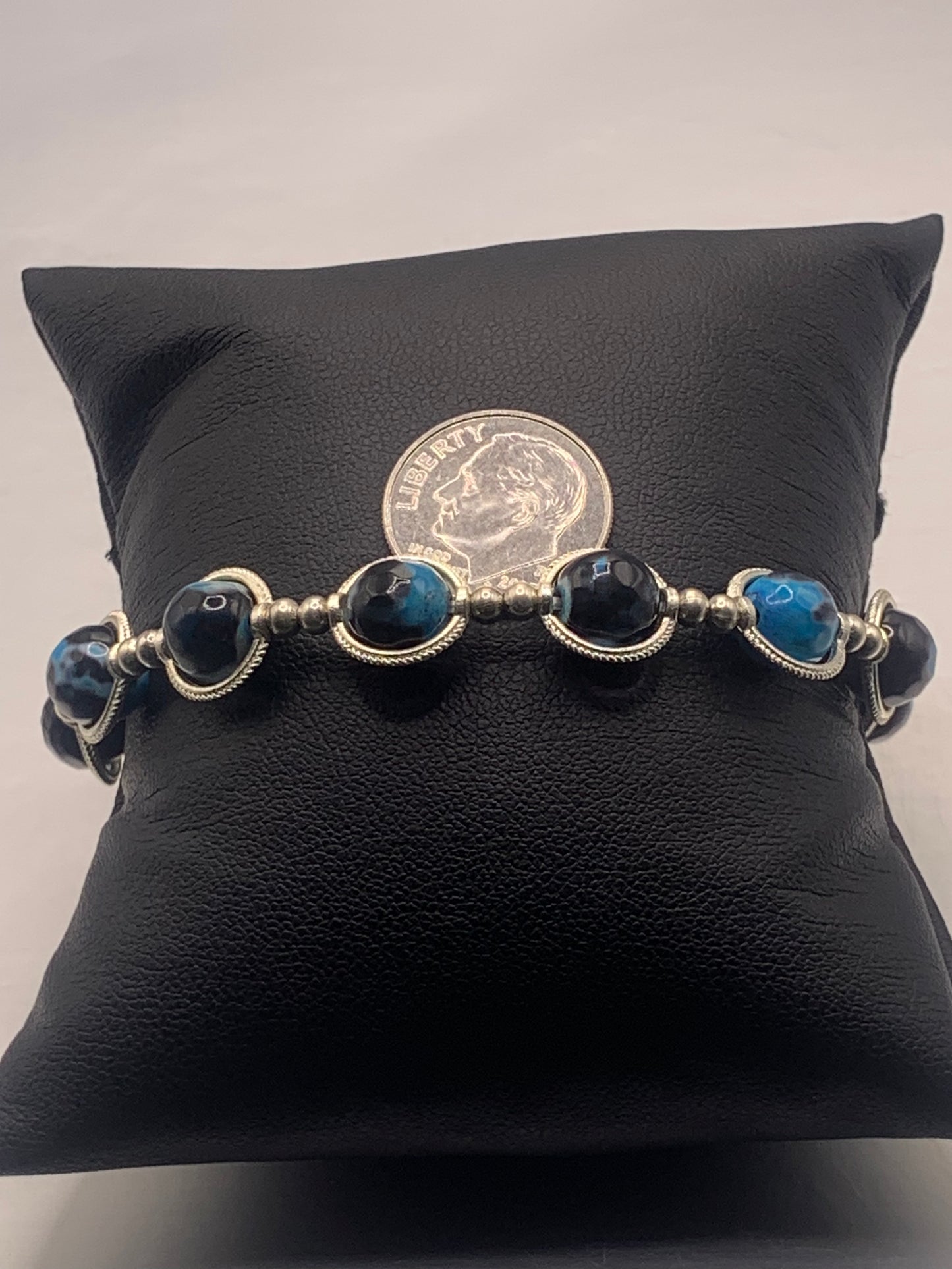 Blue orca agate semi precious stone/crystal elastic beaded bracelet with silver colored rings