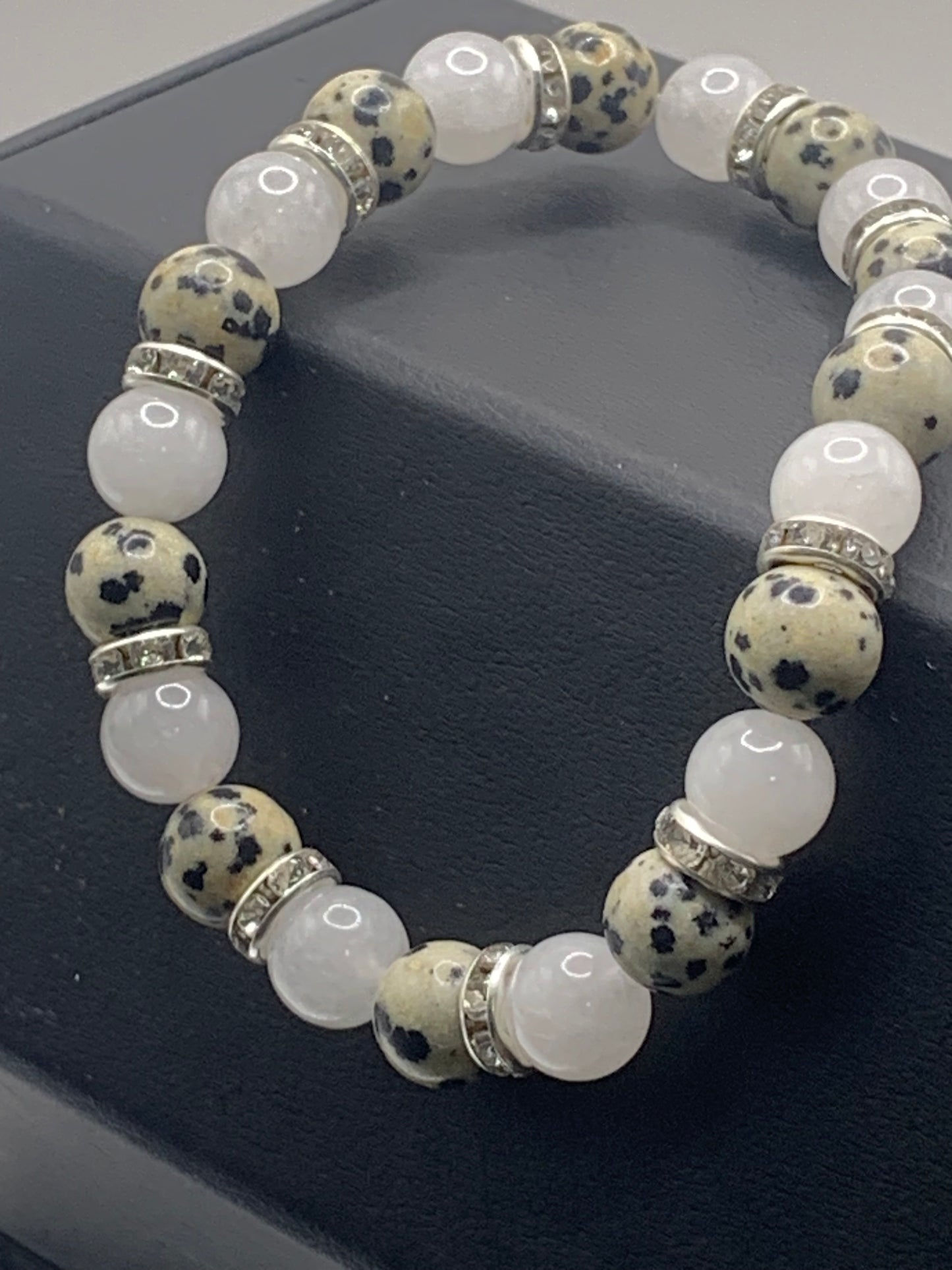 Dalmatian jasper and white chalcedony semi precious stone/crystal elastic beaded bracelet with clear rondelle's