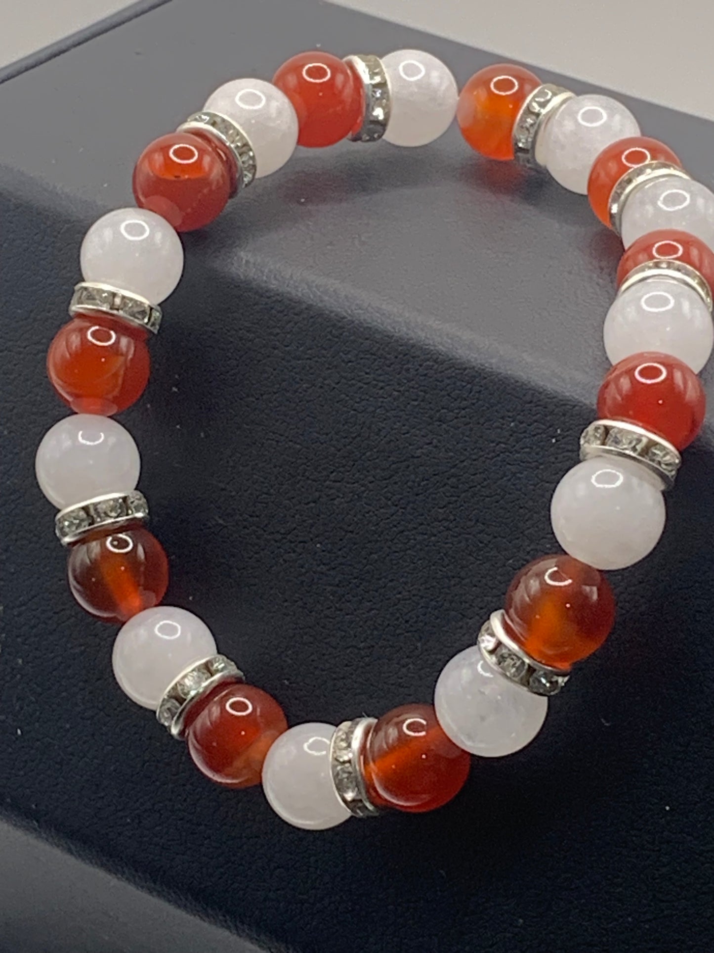 Red agate and white chalcedony semi precious stone/crystal elastic beaded bracelet with clear rondelle's