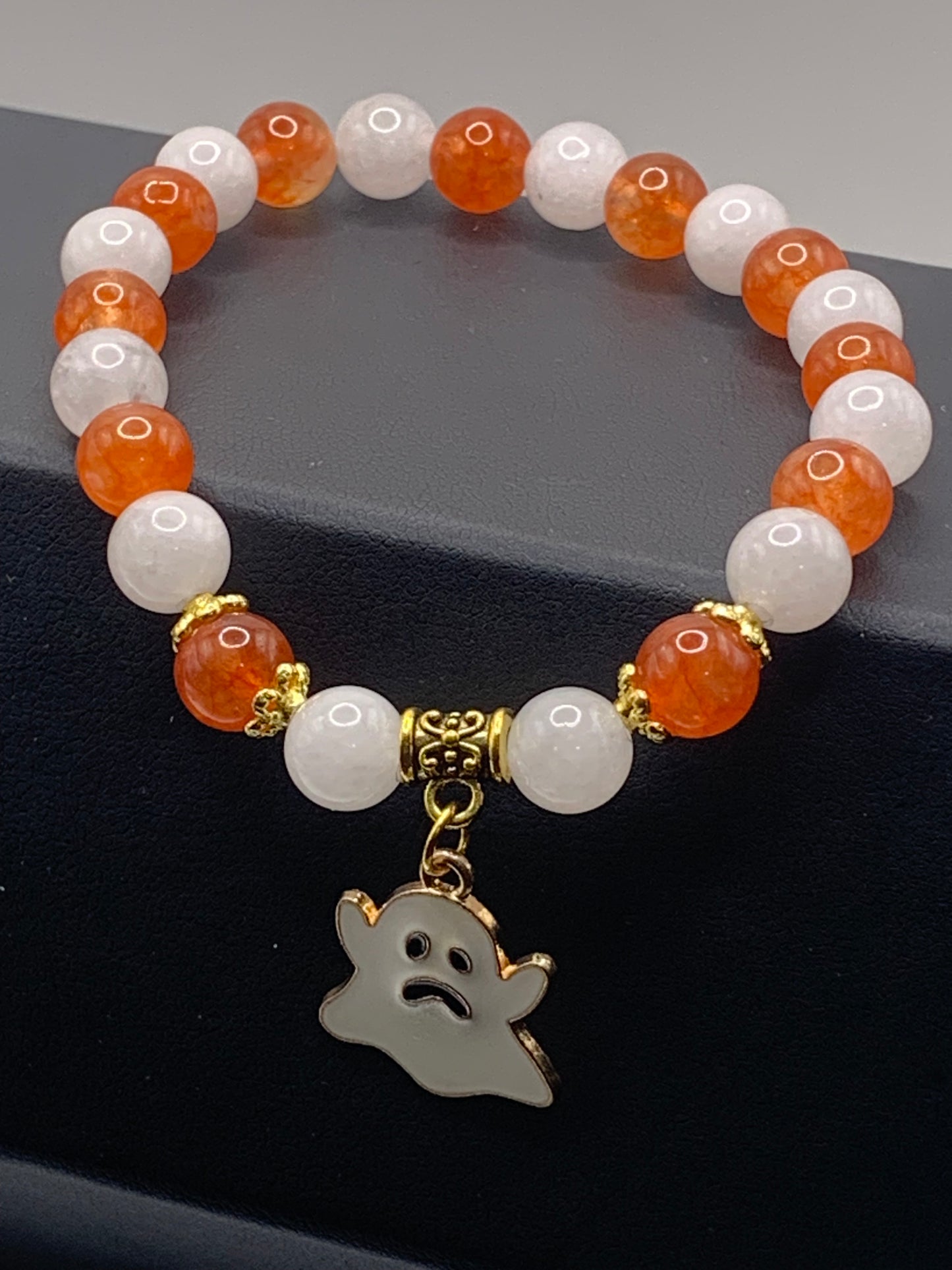 White chalcedony and phoenix agate semi precious stone/crystal elastic beaded bracelet with Halloween charm