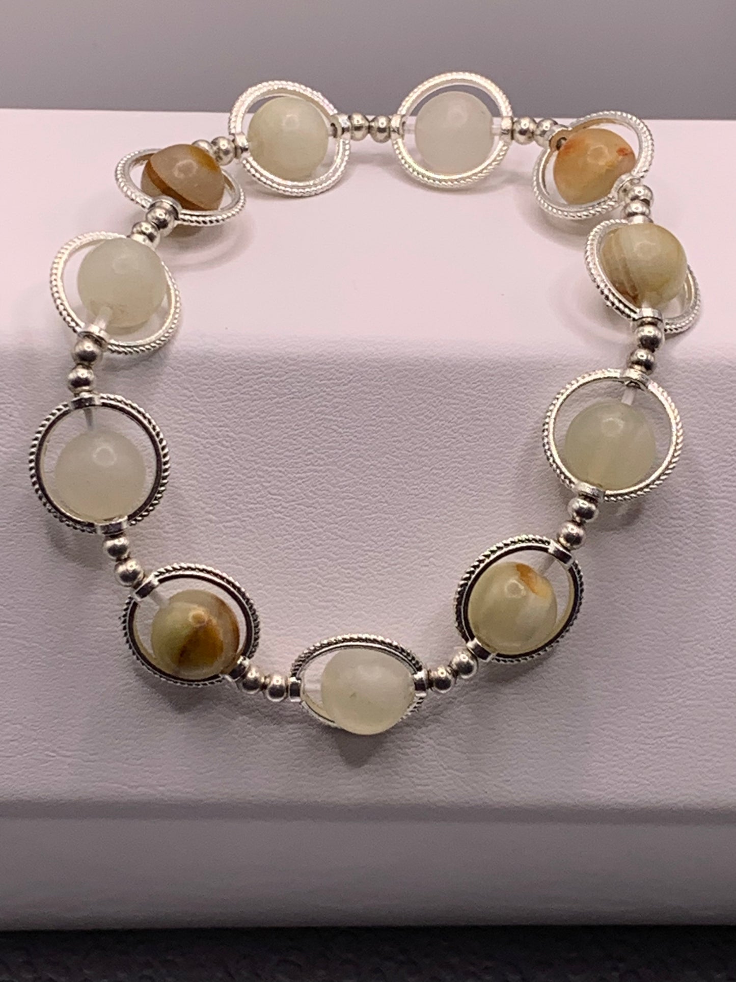 Afghan jade semi precious stone/crystal elastic beaded bracelet with silver colored rings