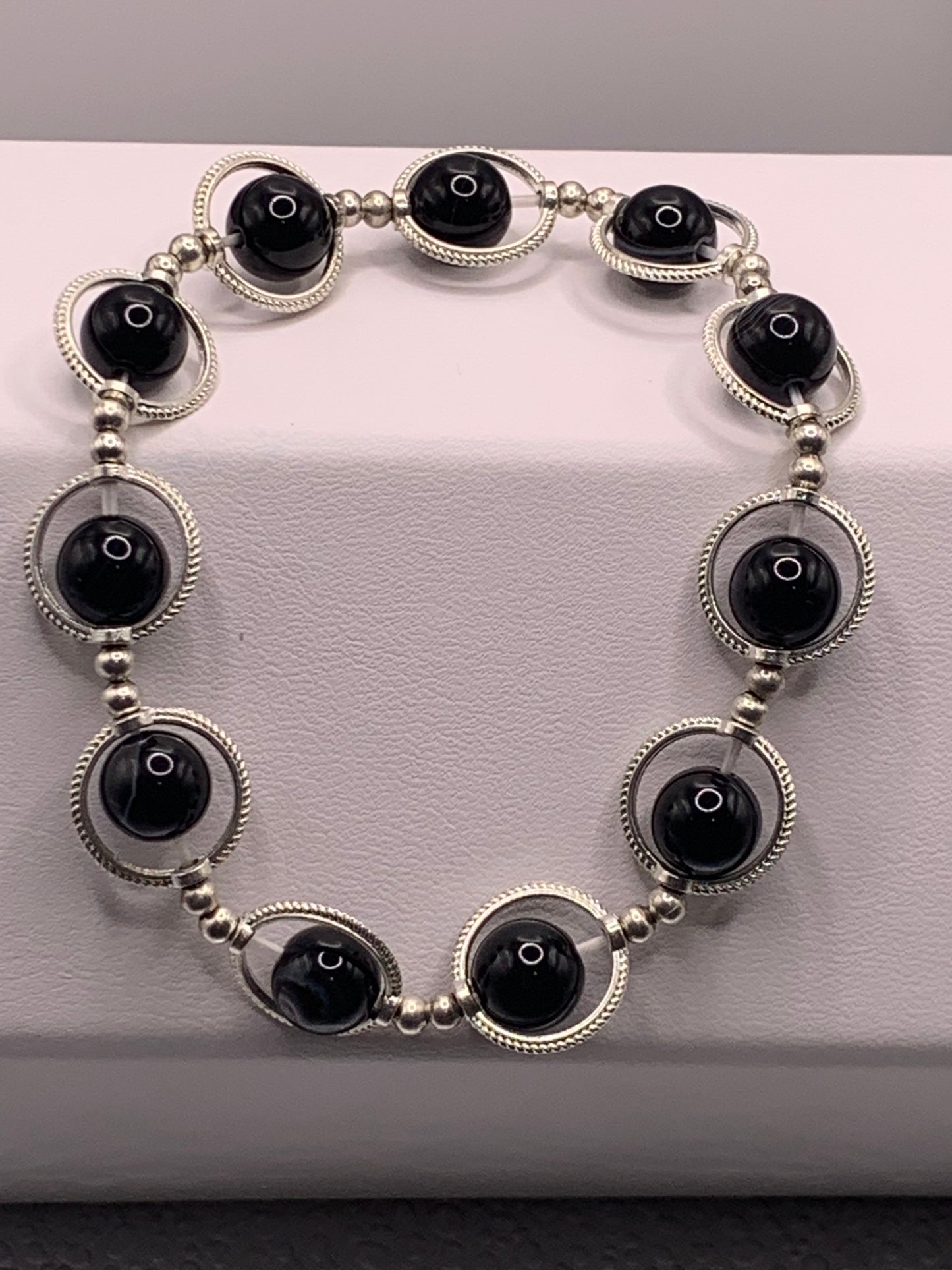Black lace agate semi precious stone/crystal elastic beaded bracelet with silver colored rings